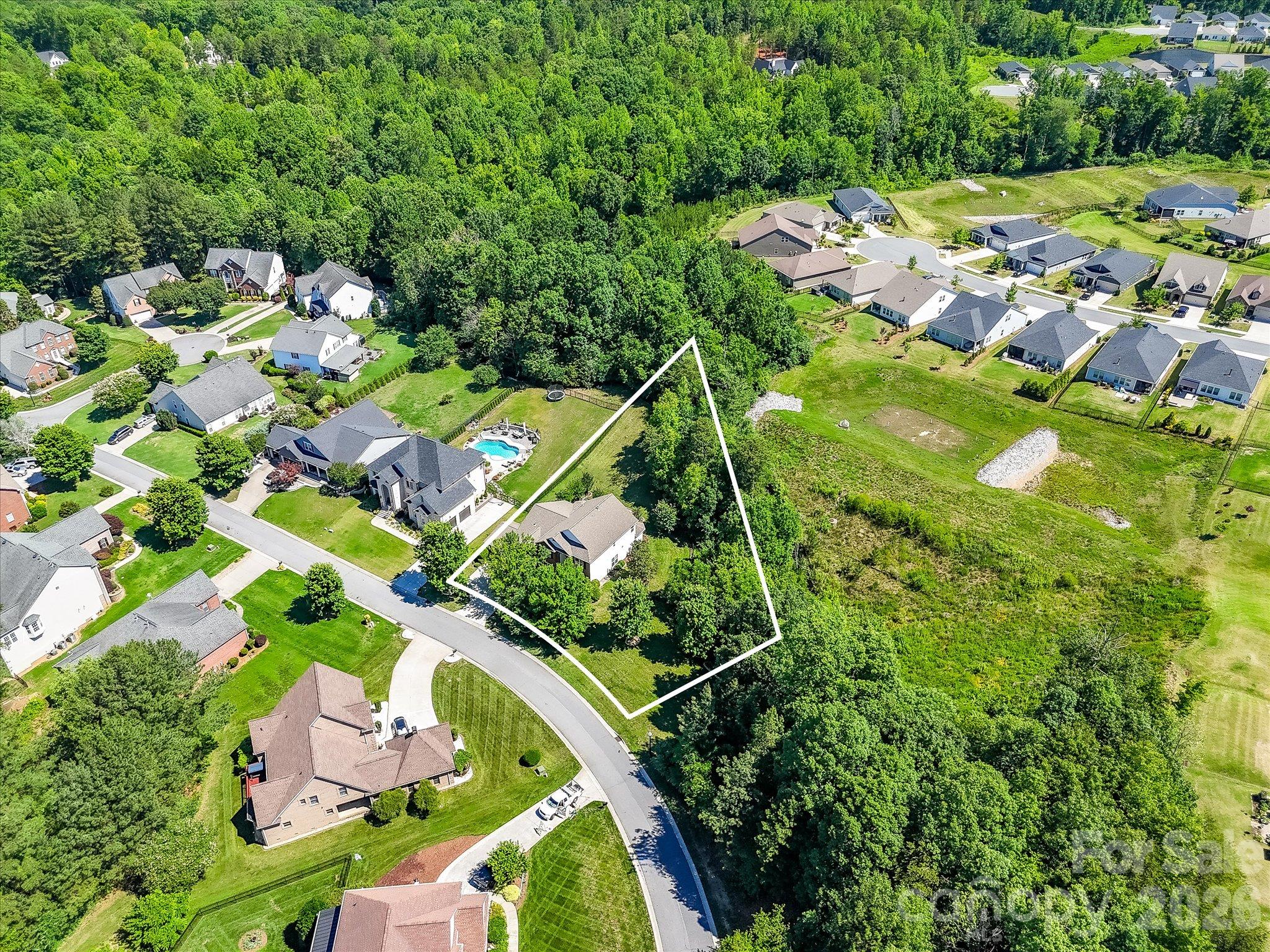 Ideally situated on a premium homesite with a wooded backdrop, offering both privacy and a desirable neighborhood location. - 1788 Oakmont Drive, Denver