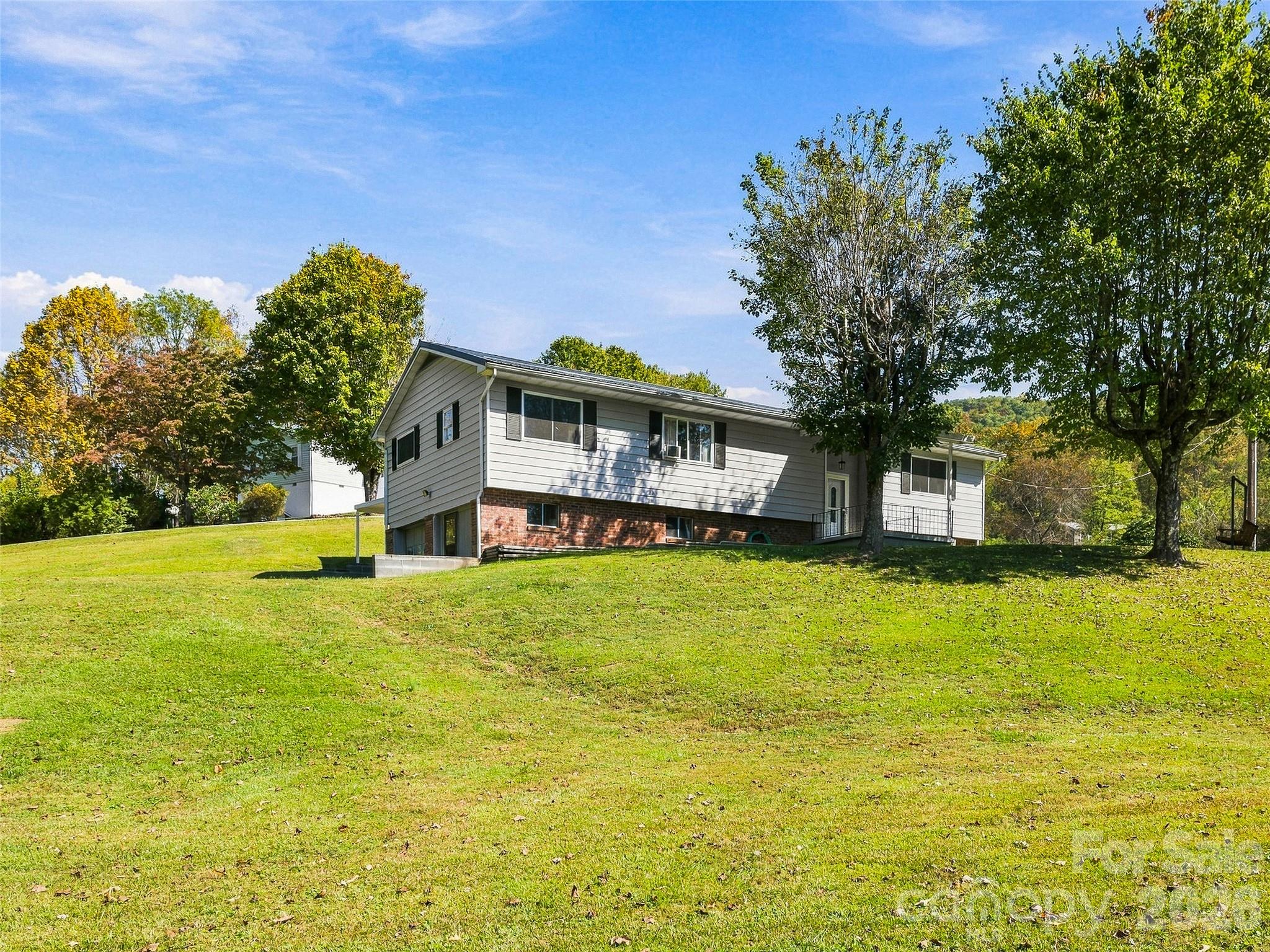 Single Family Residence at 127 Spring Hill Drive, Pisgah Forest, photo 3 of 45