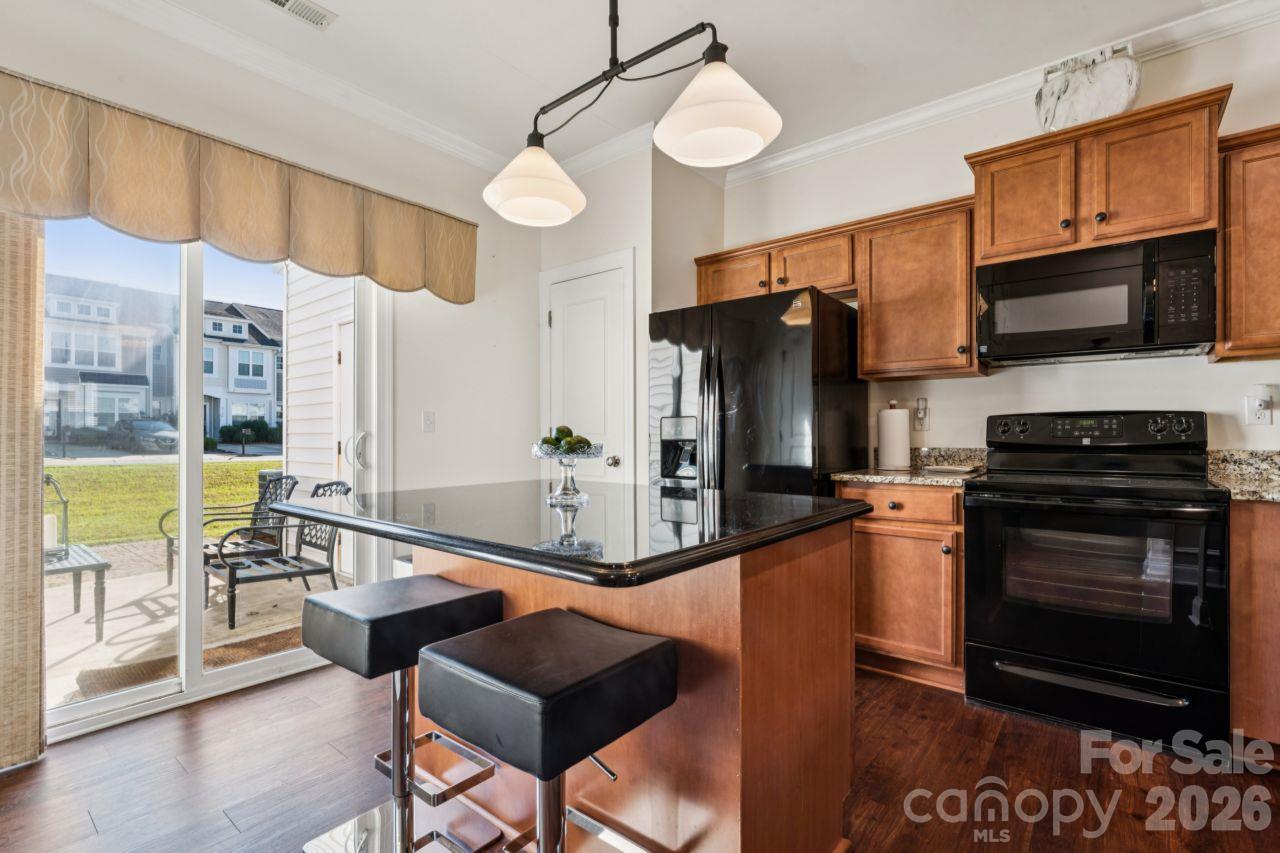 Kitchen with Seated Island - 248 Halton Crossing Drive, Concord