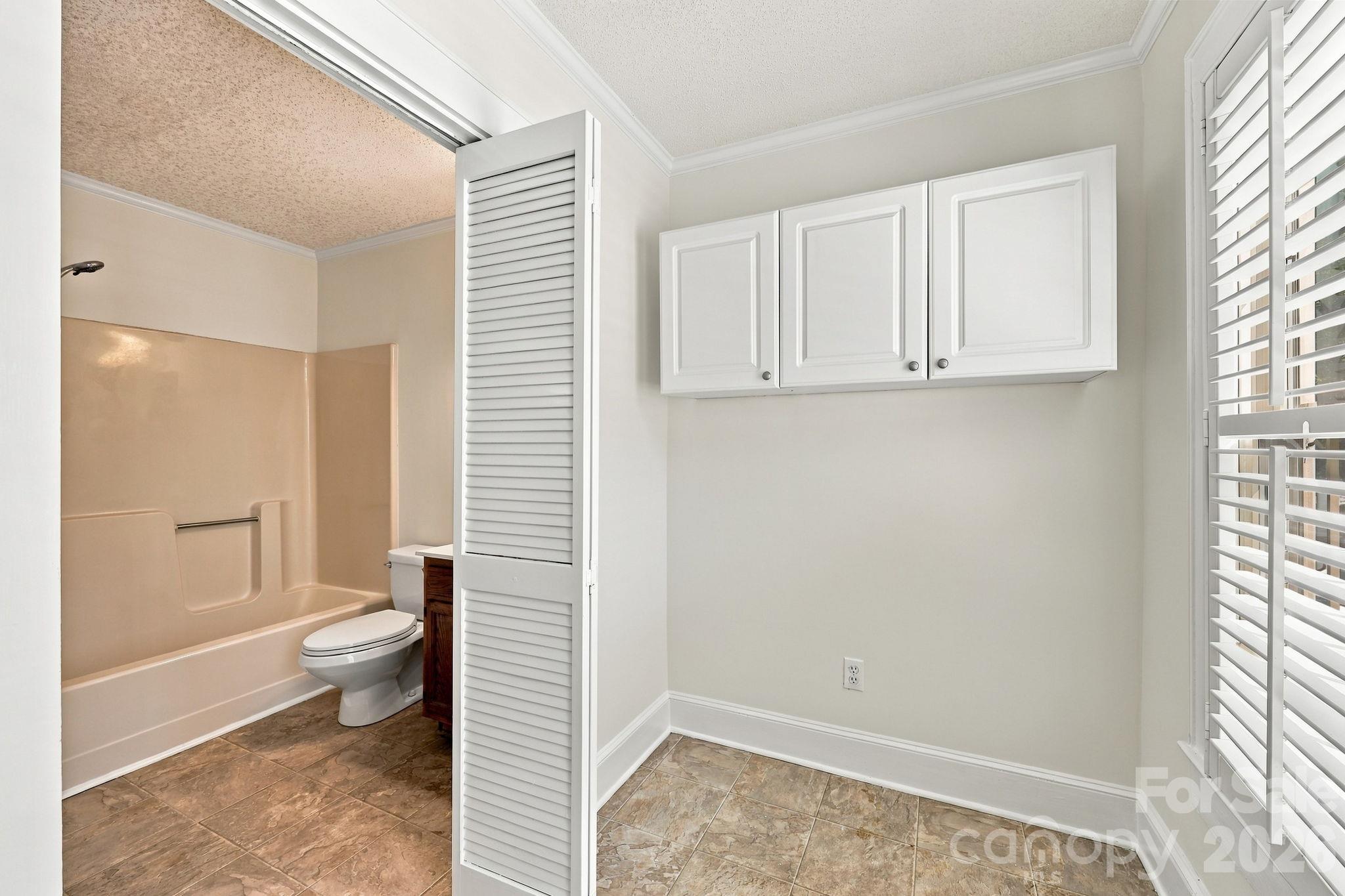 Laundry room off full bath. - 2205 Pennsylvania Avenue, Kannapolis