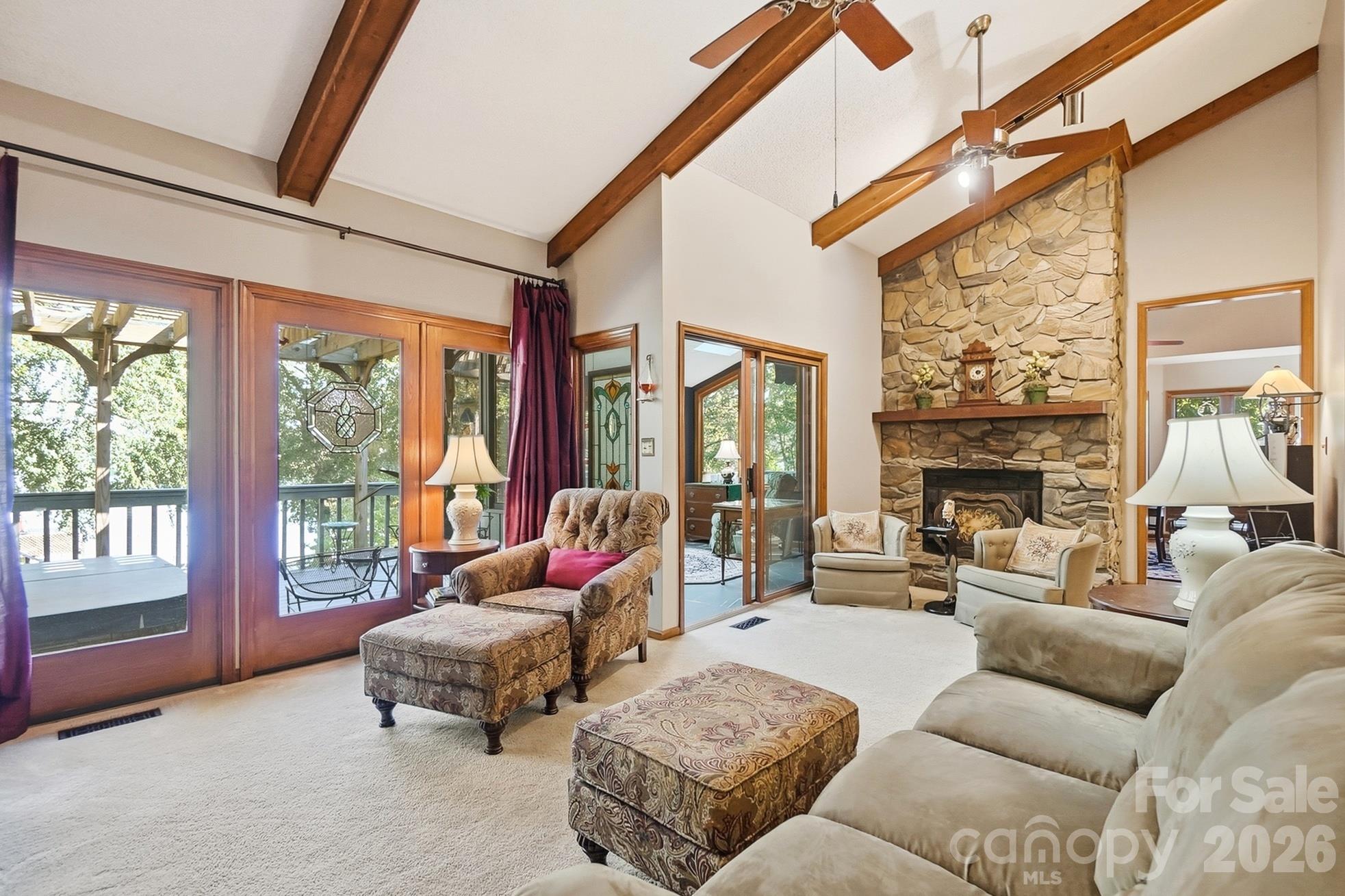 Great room flowing to sun room and kitchen - 1669 Aragon Beach Road, Rock Hill