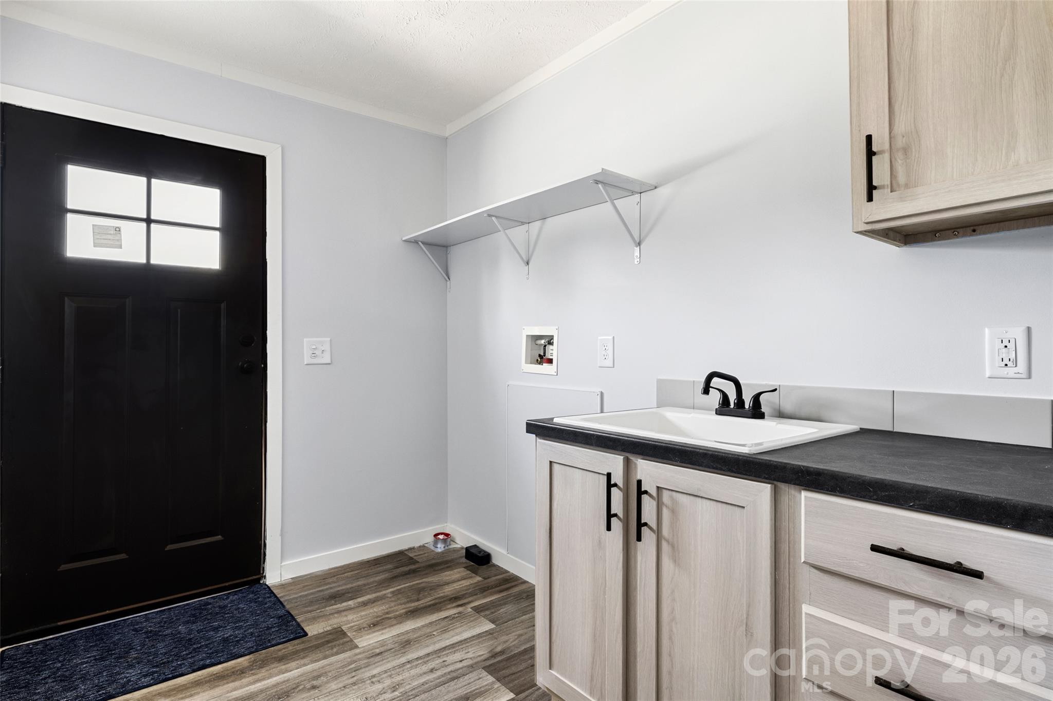 Laundry room with sink & area for second Fridge - 6414 Mingo Road, Heath Springs