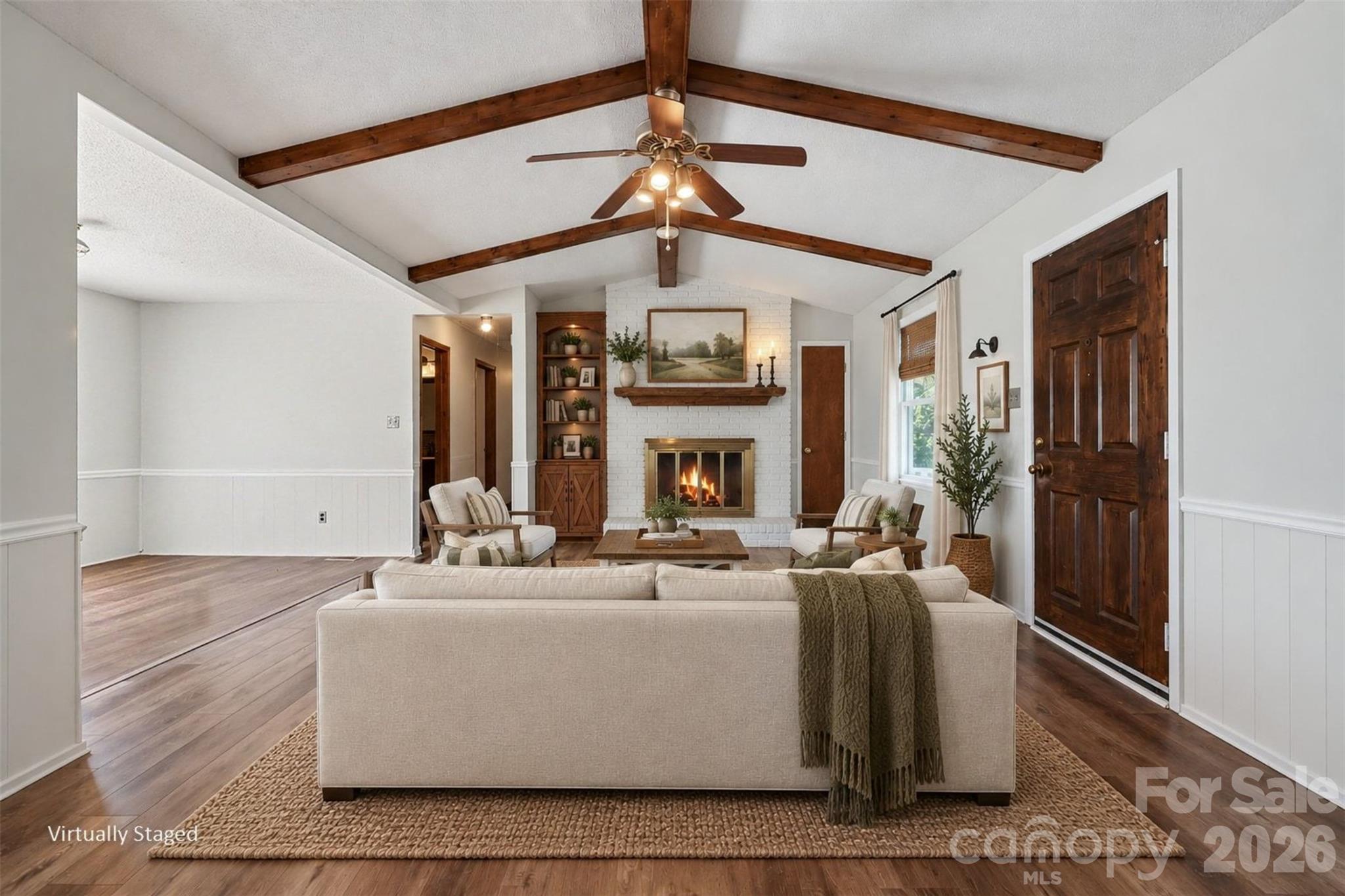 Family movie nights a dream in your large great room (24x13) with a fireplace and built-in. - 102 Roxie Lane, Belmont