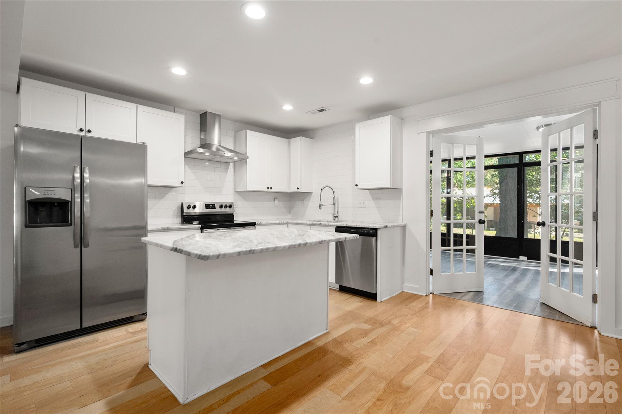 Bright white kitchen with island - 4238 Dowling Drive, Charlotte