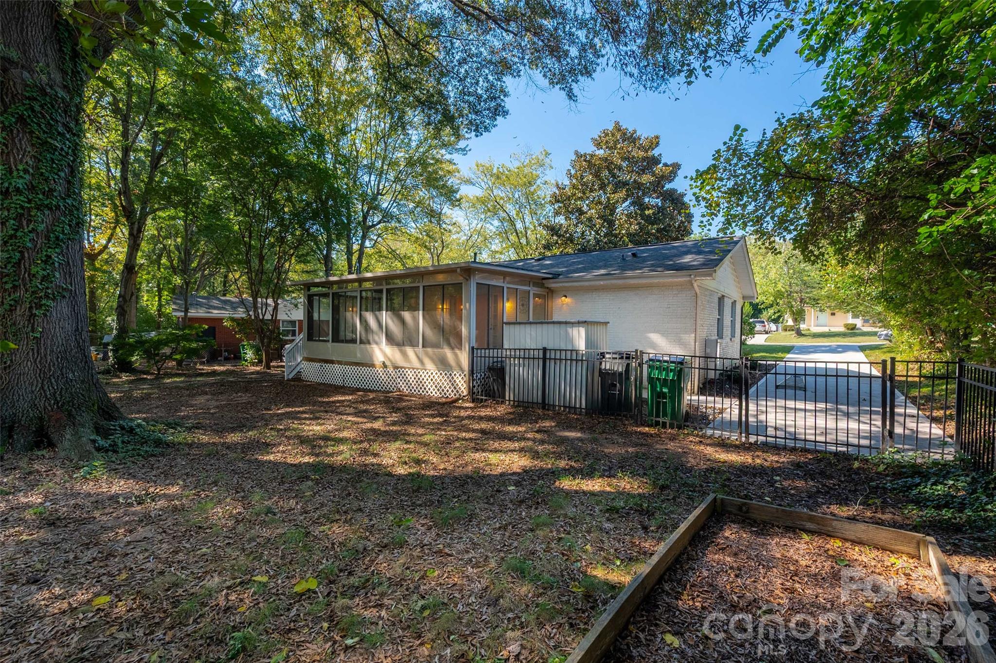 Large mature trees offer shady outdoor retreat - 4238 Dowling Drive, Charlotte