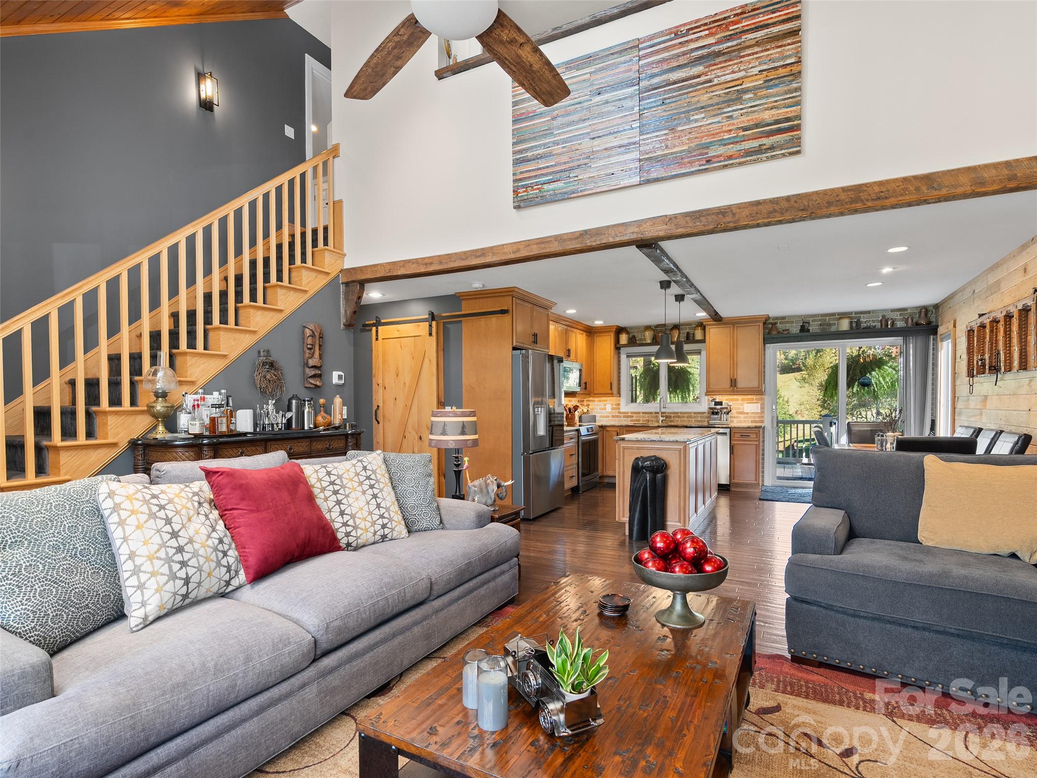 The Living Room's stunning vaulted wood ceiling is impressive. - 43 Eagle Ridge, Clyde