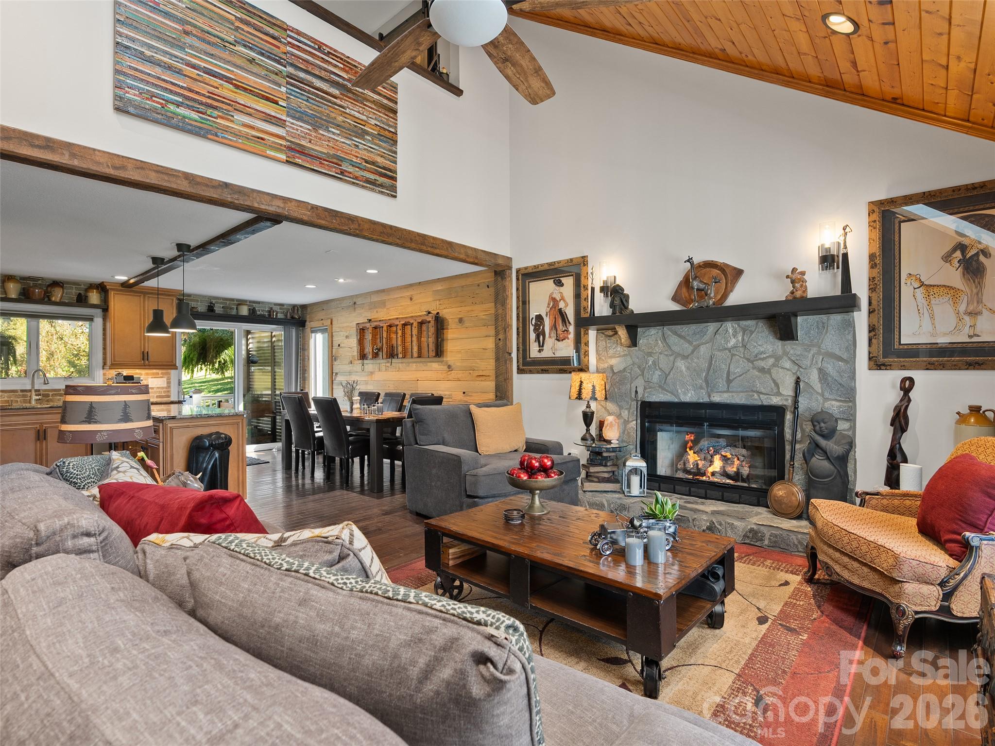 Stone fireplace has been converted from wood burning to gas logs. - 43 Eagle Ridge, Clyde