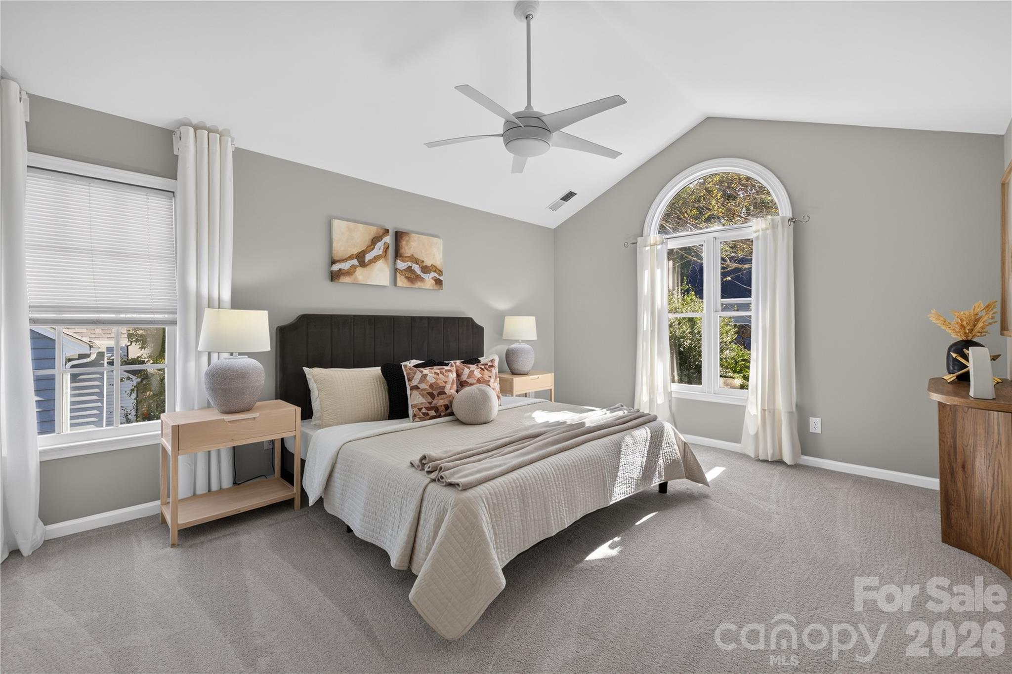 Spacious primary en suite with dual walk-in closets and attached bath. - 4711 Beech Crest Place, Charlotte