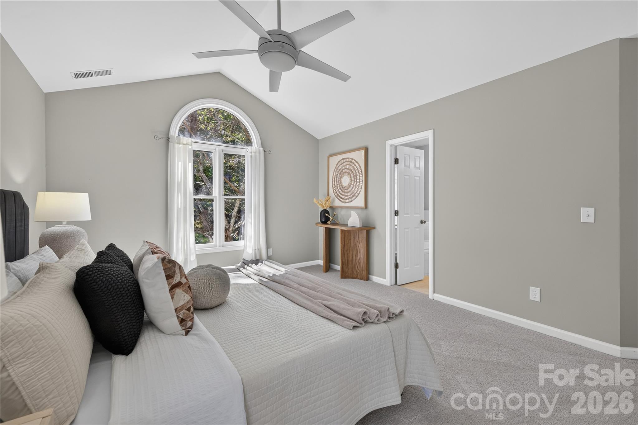 Spacious primary en suite with dual walk-in closets and attached bath. - 4711 Beech Crest Place, Charlotte