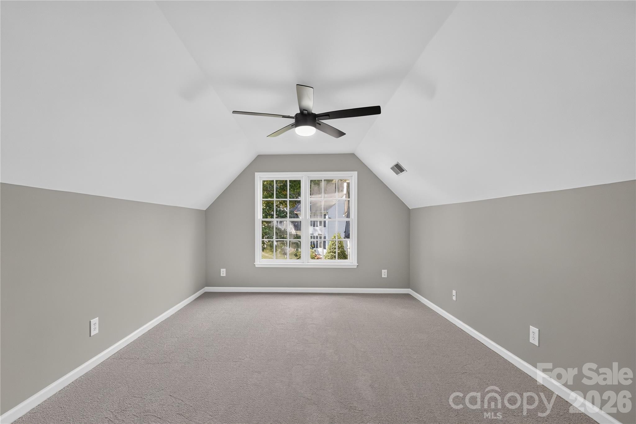 4th bedroom/Bonus Room is perfect for a home office, gym, media room, or guest space. Also includes under-the-eaves storage. - 4711 Beech Crest Place, Charlotte