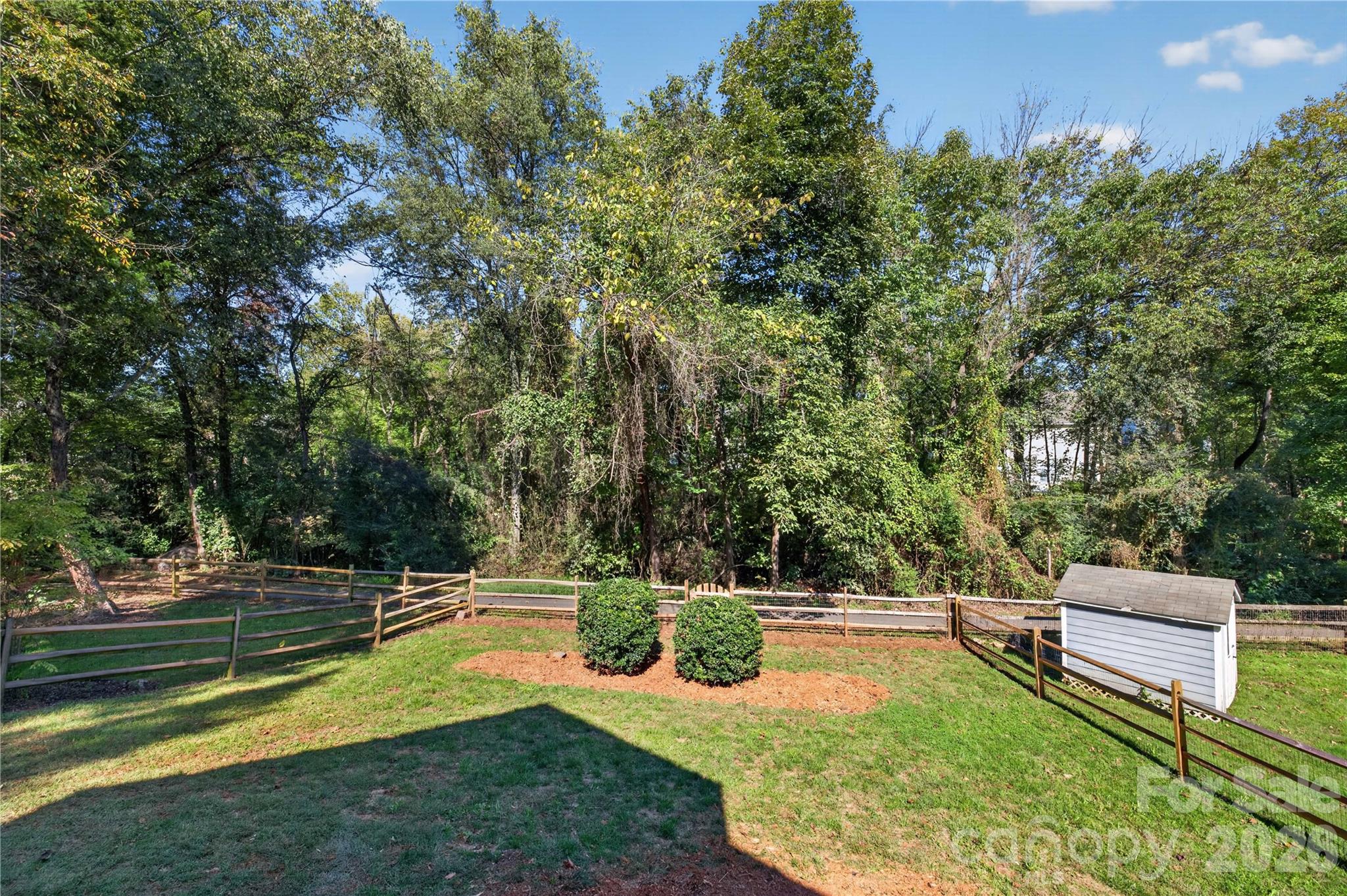 Direct access to the neighborhood greenway from the backyard offering miles of paved trails. - 4711 Beech Crest Place, Charlotte