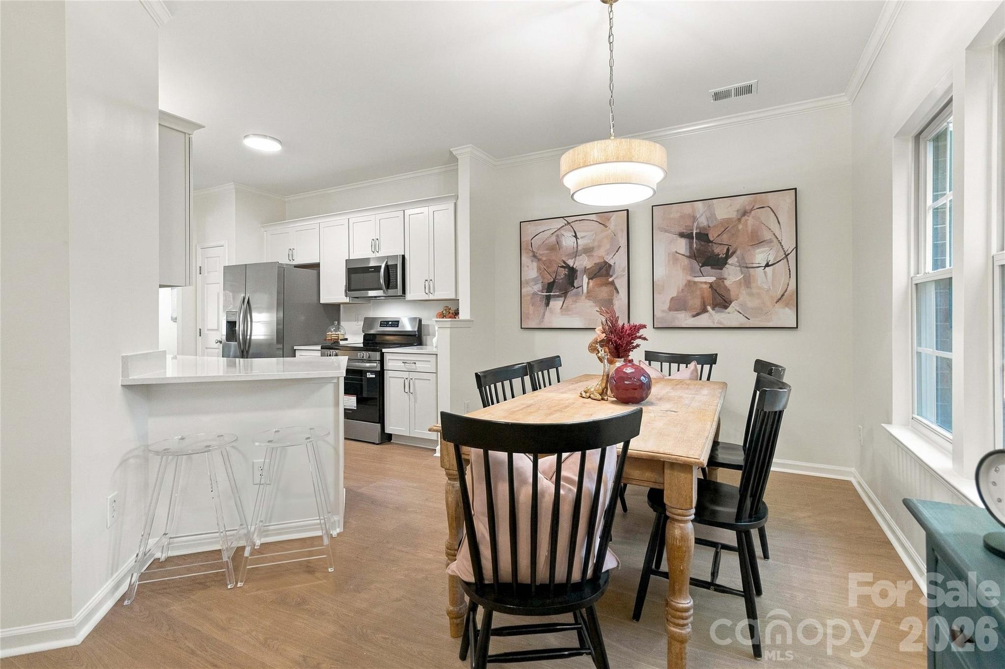 Formal dining for larger gatherings and bar top for quick meals! - 18631 Oakhurst Boulevard, Cornelius