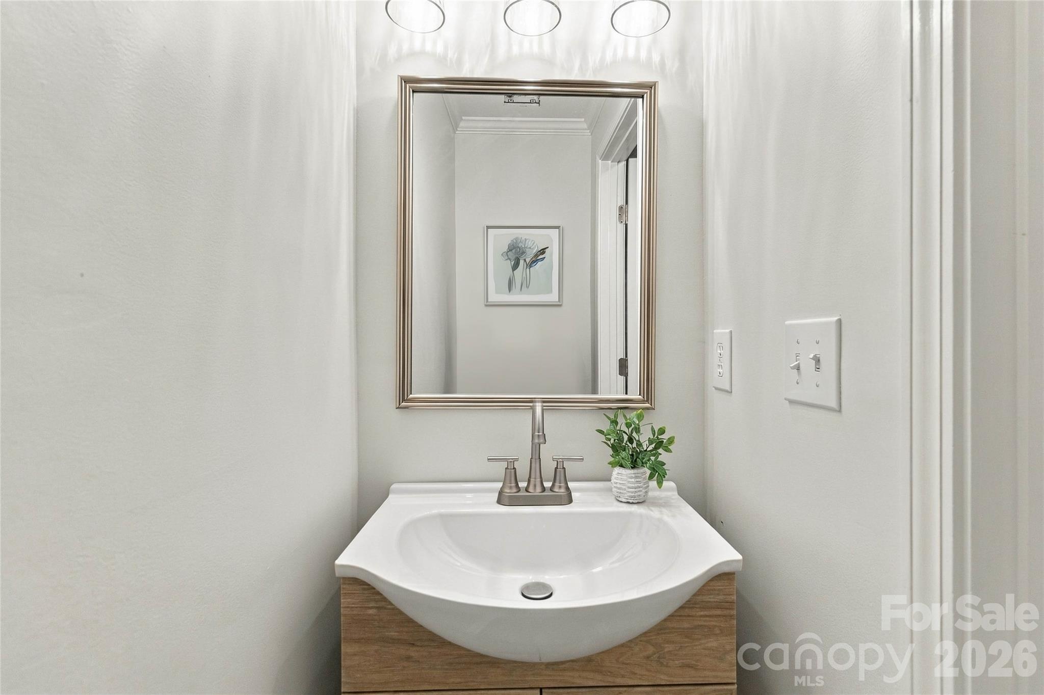 All new vanity and fixtures in half bathroom on main floor! - 18631 Oakhurst Boulevard, Cornelius