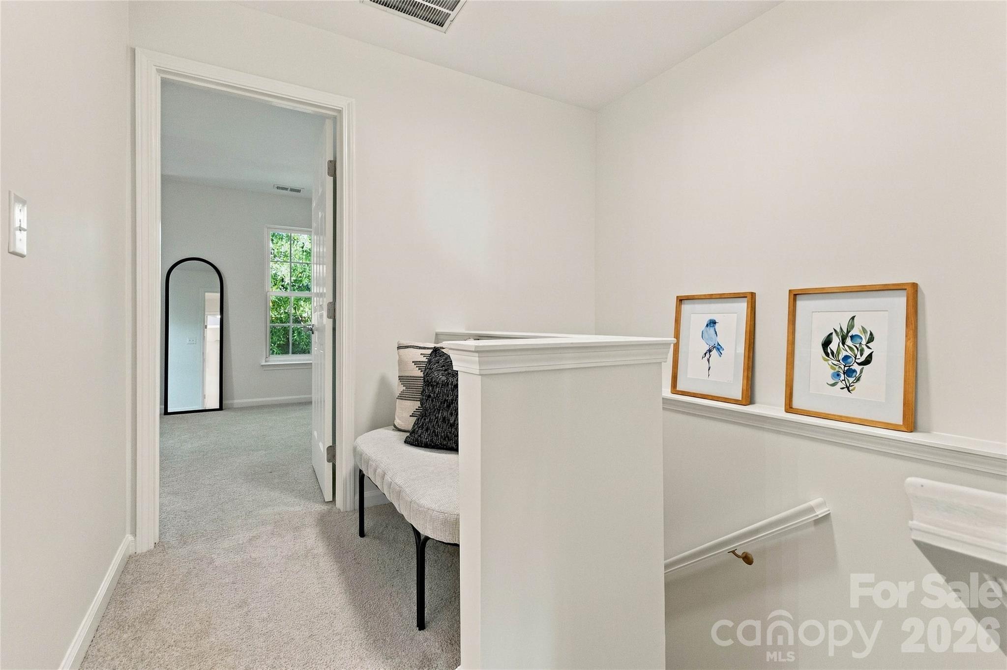 Landing in hallway provides privacy between bedrooms. - 18631 Oakhurst Boulevard, Cornelius