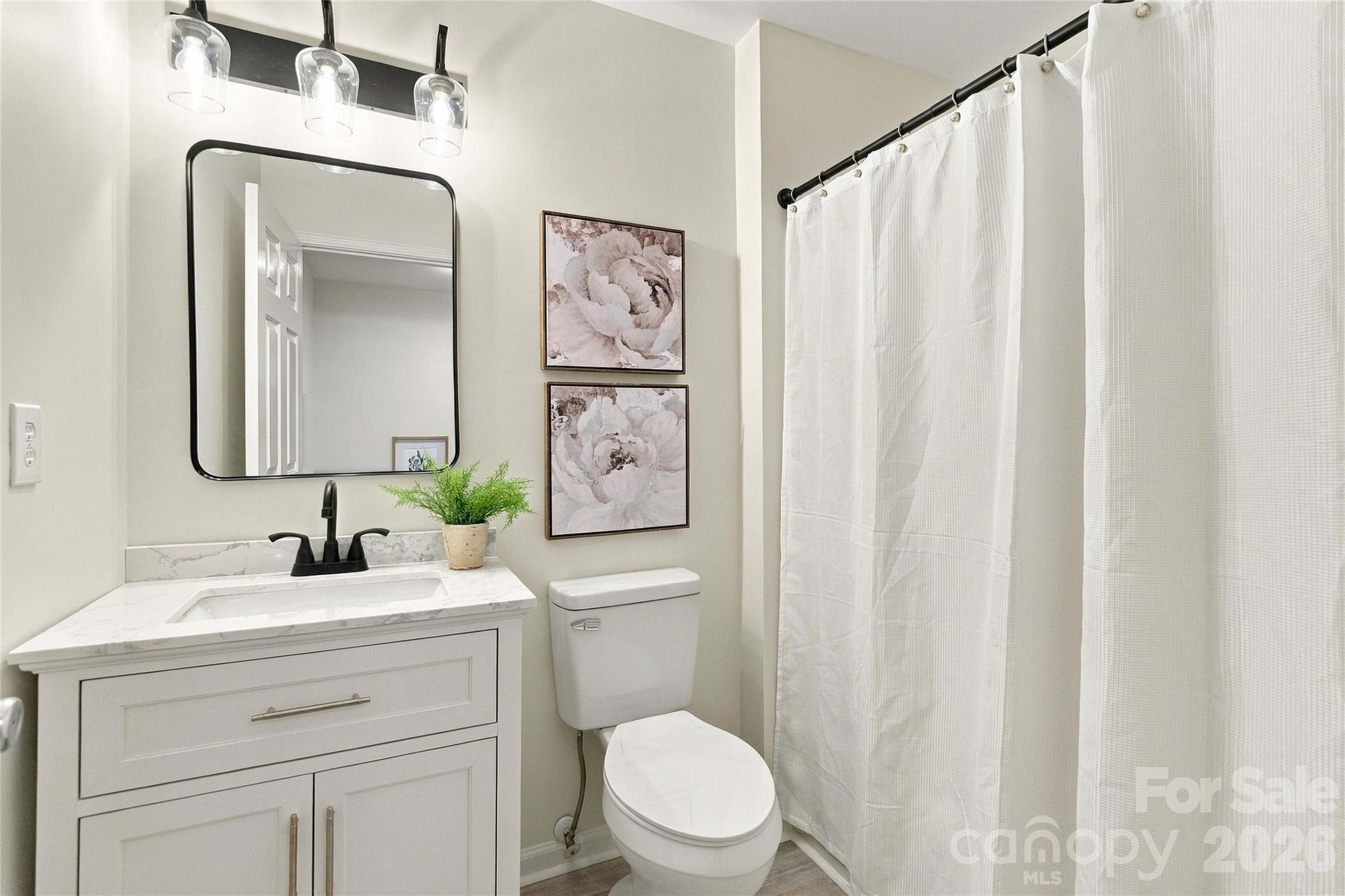 Full bathroom in hallways has all new vanity and fixtures too! - 18631 Oakhurst Boulevard, Cornelius