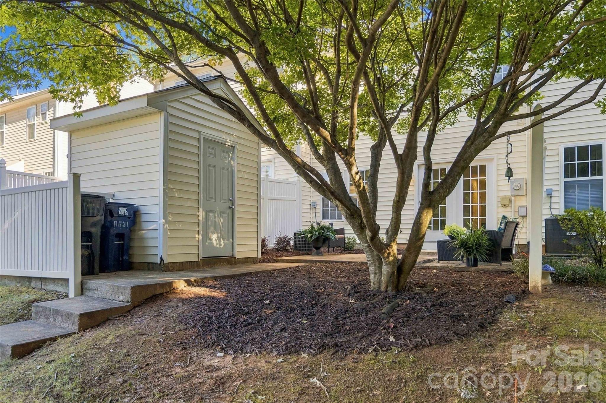 Storage and trash can enclosure in rear - 18631 Oakhurst Boulevard, Cornelius