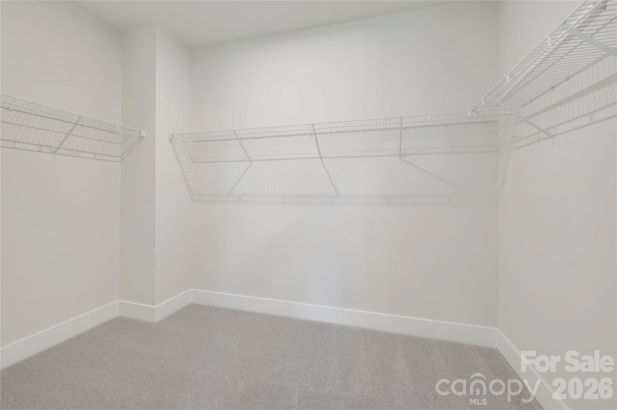 Primary walk-in closet - 75 Seven Oaks Landing, Belmont