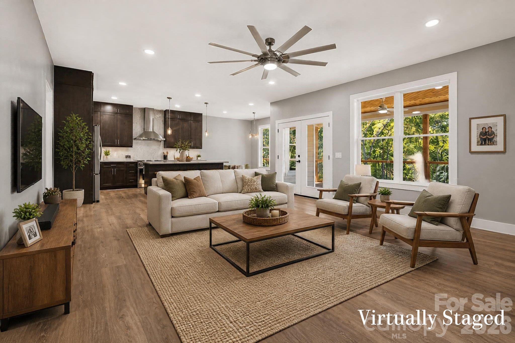 Virtually staged living room. We love this open yet cozy floor plan. - 160 Pumice Drive, Statesville