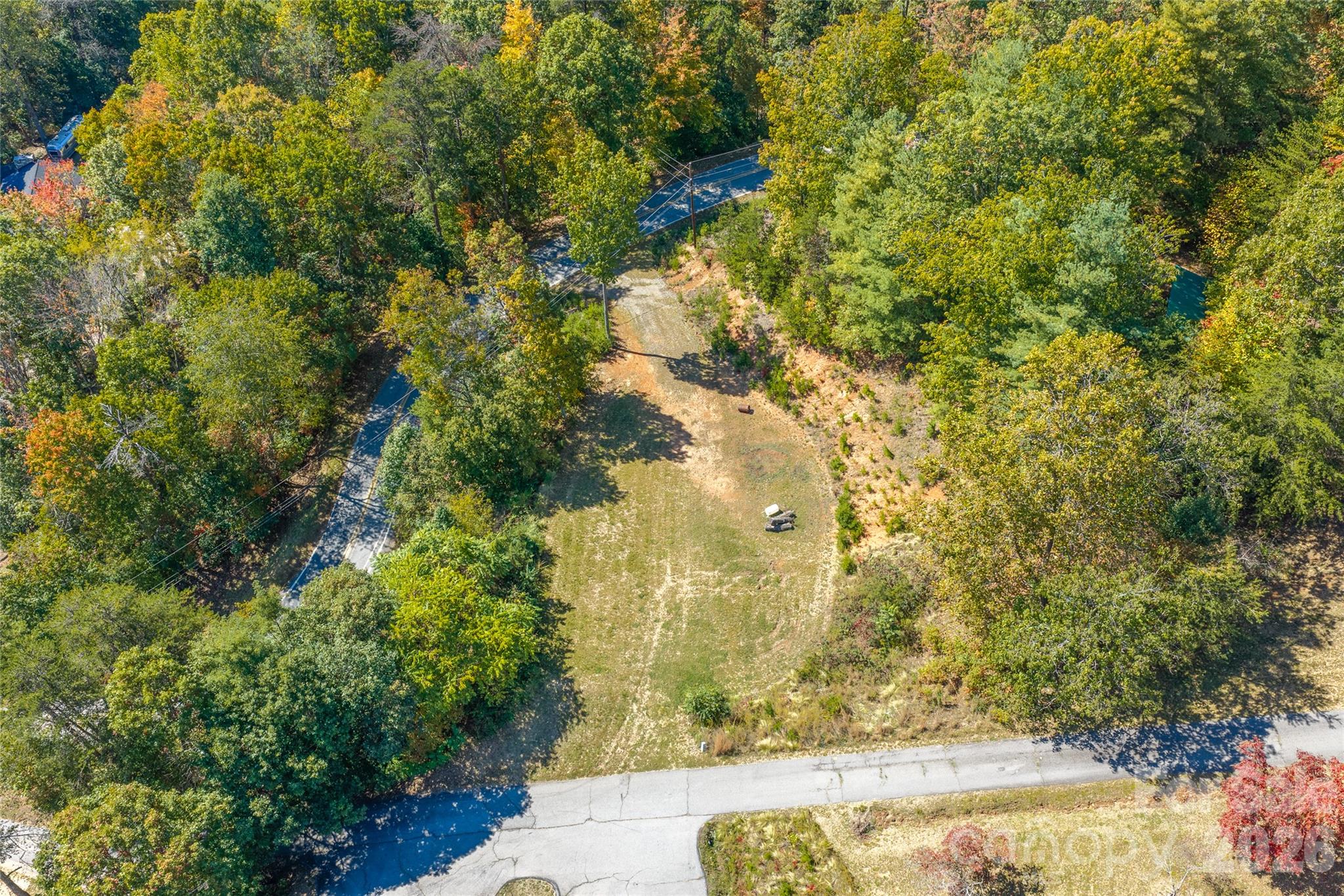 A homesite is already cut in—bring your plans and make the most of the mountain setting and views. - 117 & 99999 Spivey Mountain Road, Asheville