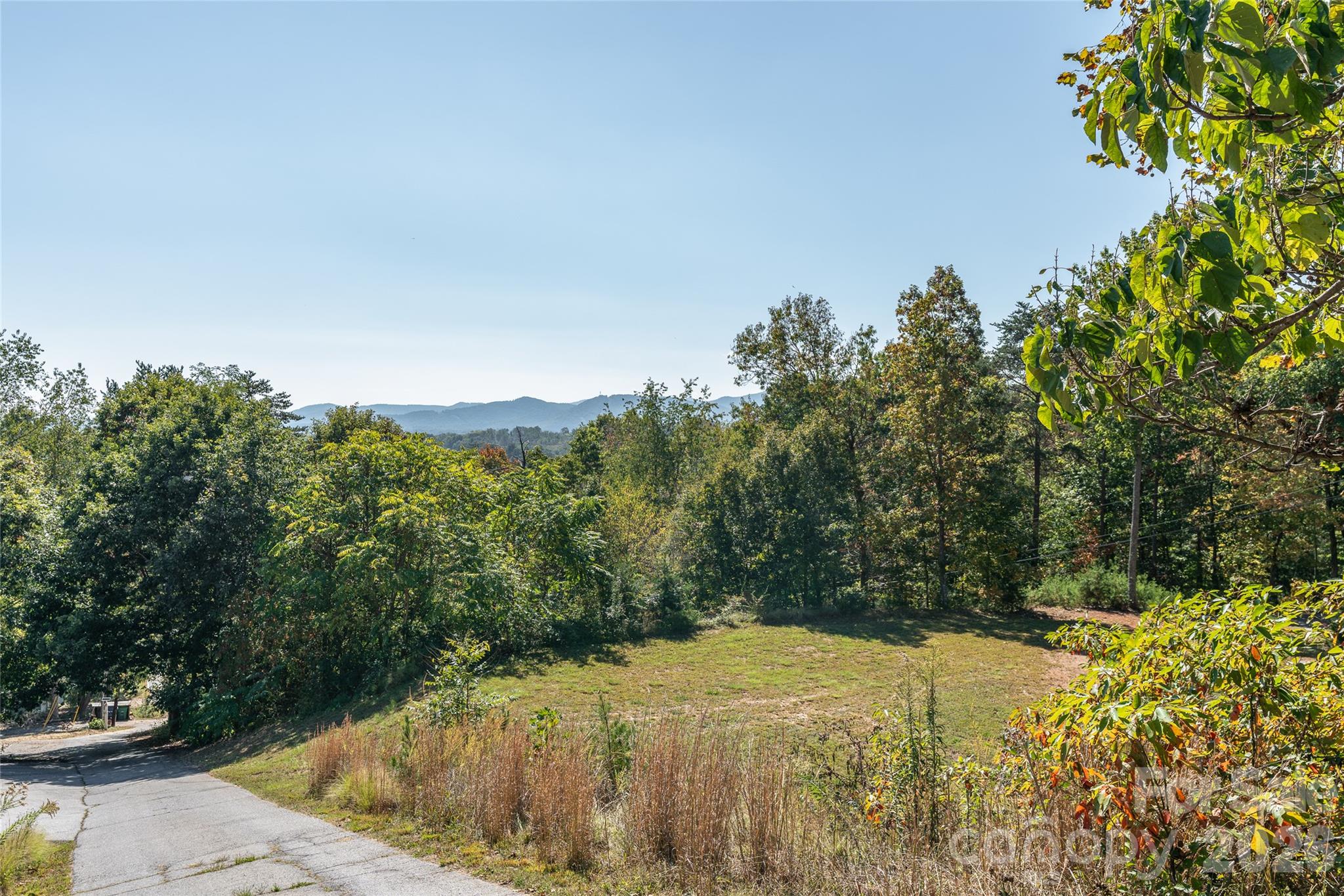 Level building site positioned to take advantage of the surrounding mountain views. - 99999 Spivey Mountain Road, Asheville