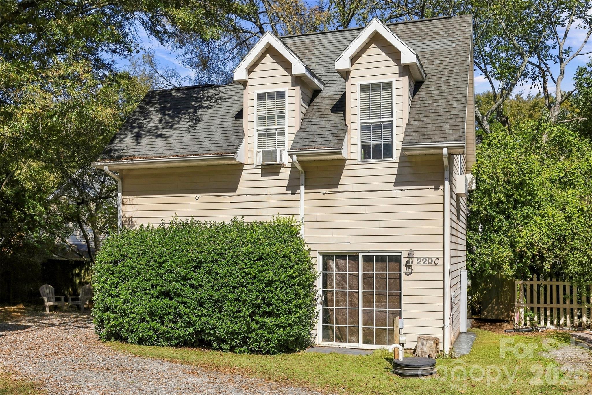 Unit C: two-story accessory unit with dormers and an attached garage. - 220 Armour Street, Davidson