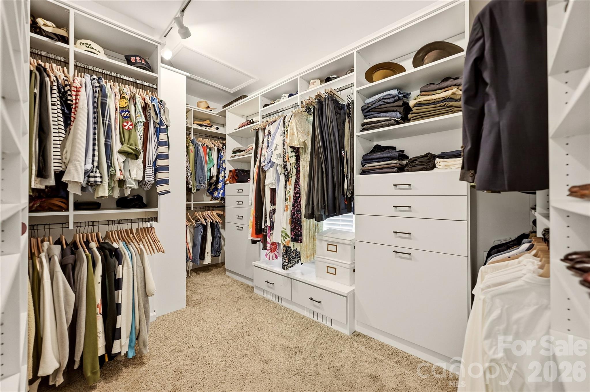 Large primary custom closet - 16521 Plantation Woods Drive, Charlotte