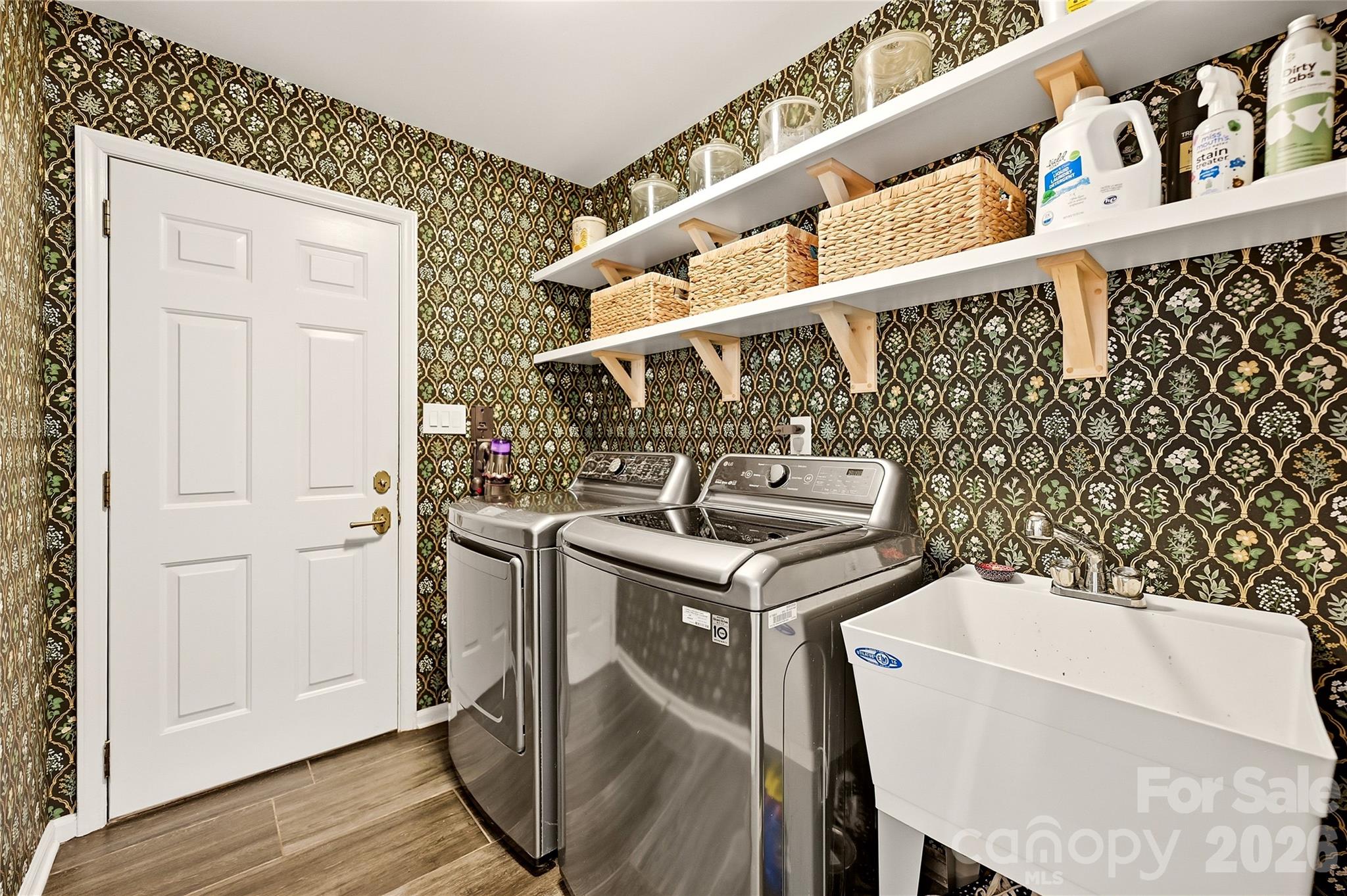 Laundry room on the main - 16521 Plantation Woods Drive, Charlotte