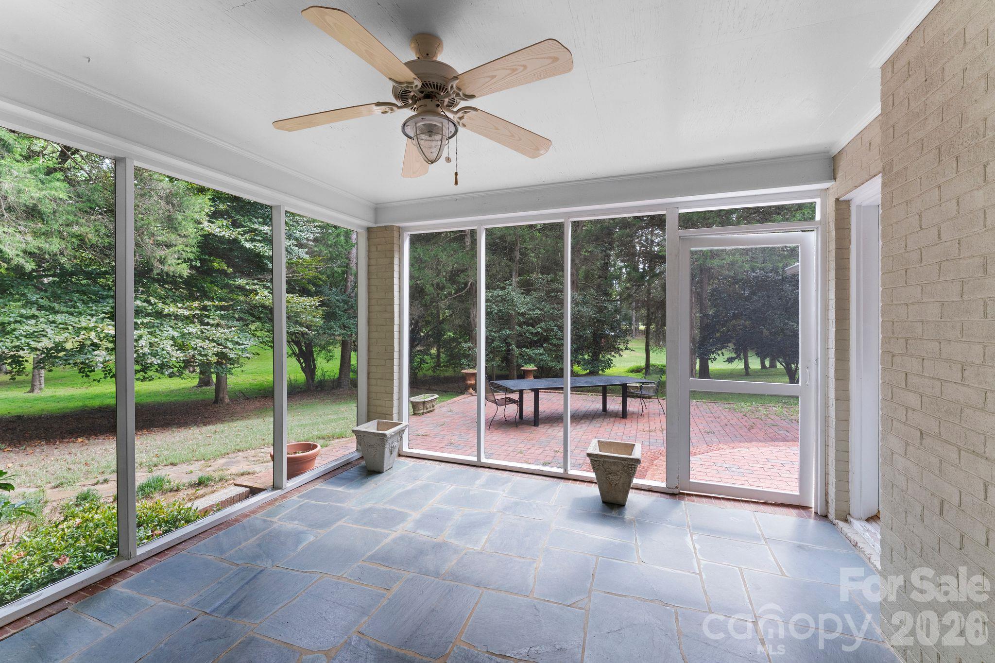 Beautiful screened porch overlooking the private backyard - 2006 Grey Road, Davidson