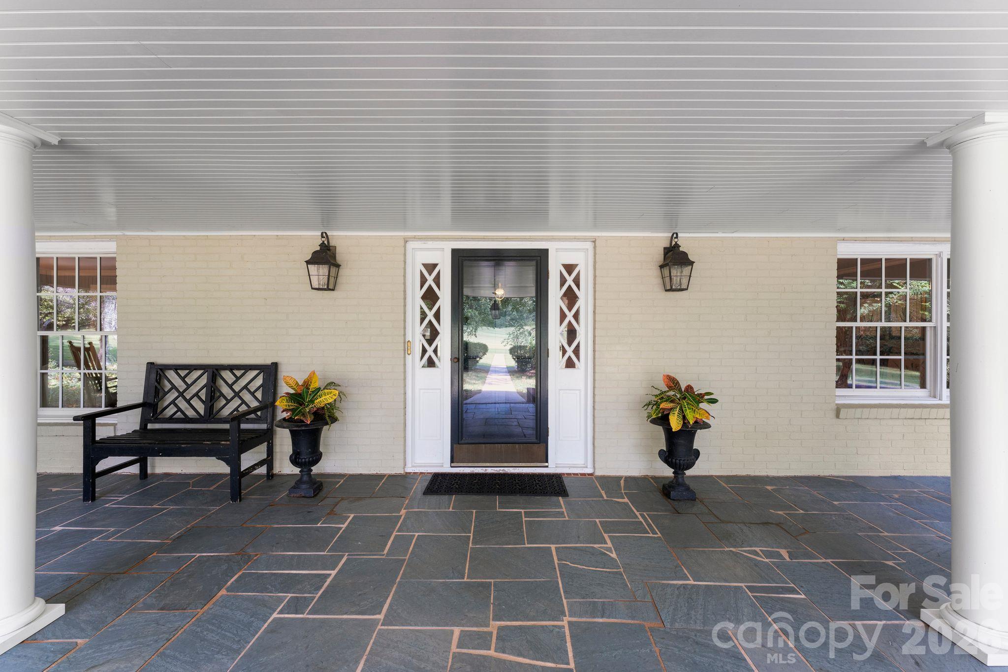 Wide covered front porch welcomes you - 2006 Grey Road, Davidson