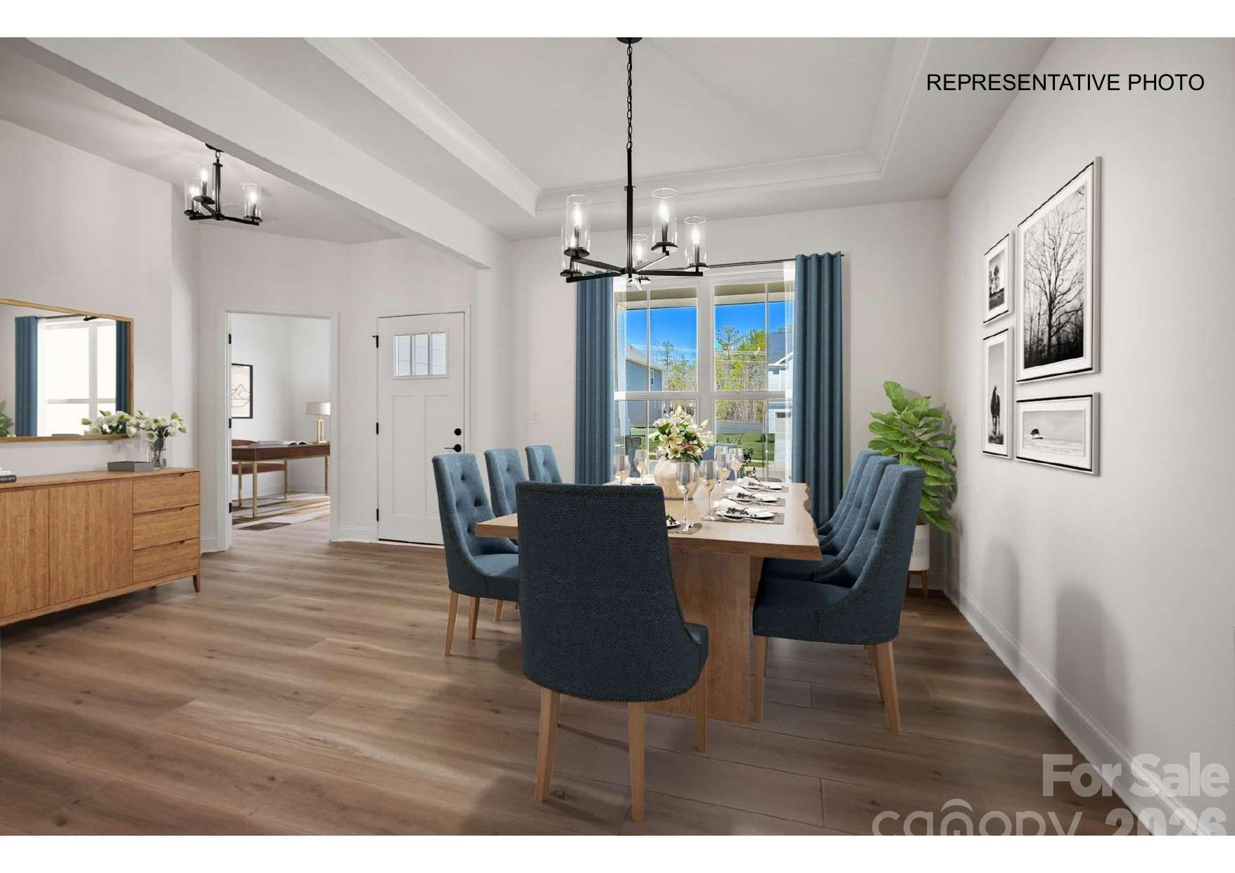 Spacious formal dining room -- head through the adjoining butler's pantry straight into your gourmet kitchen! - 7689 Pedigree Circle, Lancaster