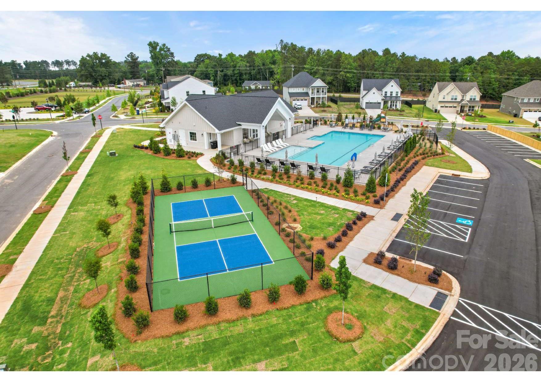 Wonderful community amenities: clubhouse, outdoor pool, pickleball court, playground, and walking trails! - 7689 Pedigree Circle, Lancaster