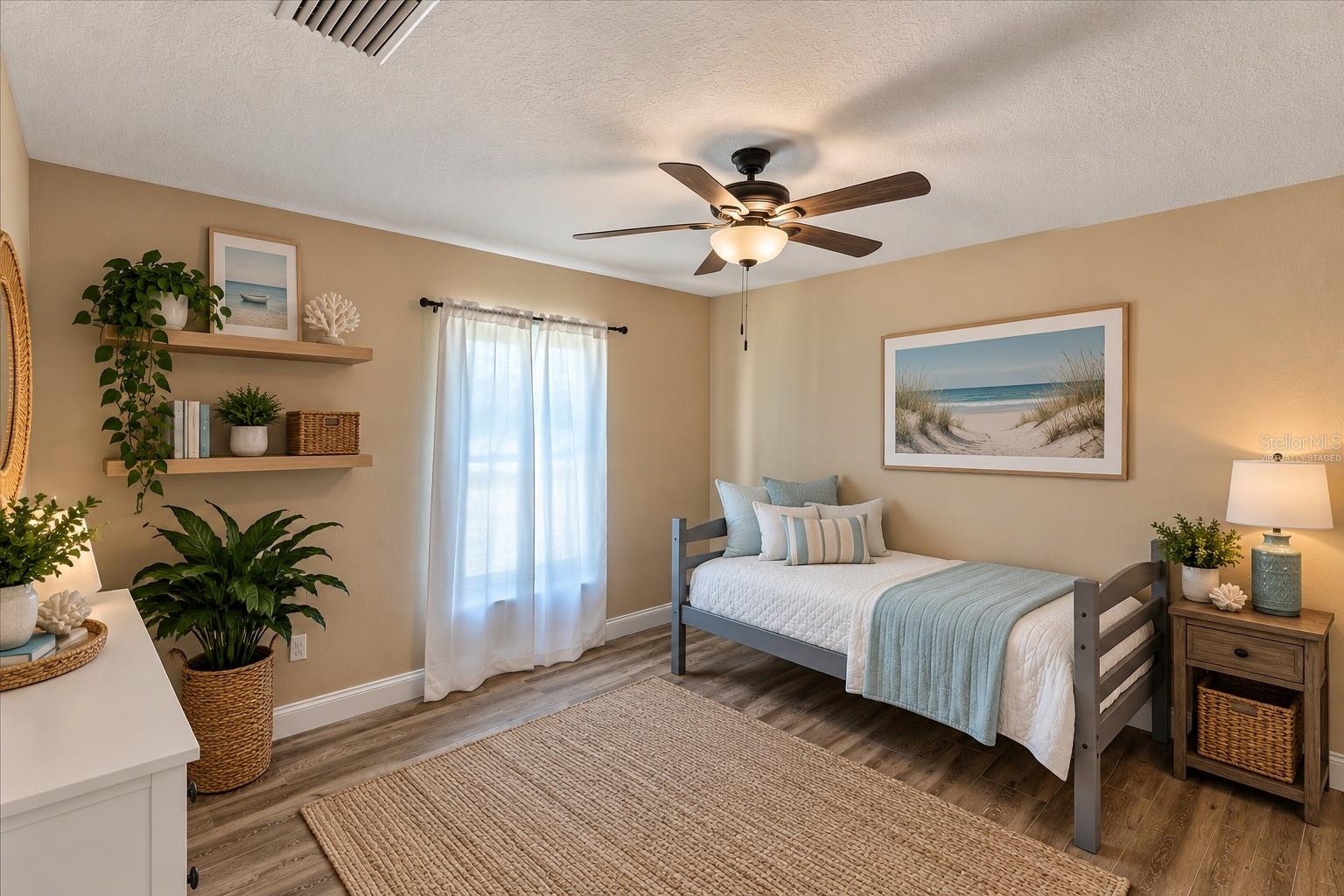 First Floor bedroom (Virtually Staged) - 6191 TURTLEMOUND RD, NEW SMYRNA BEACH