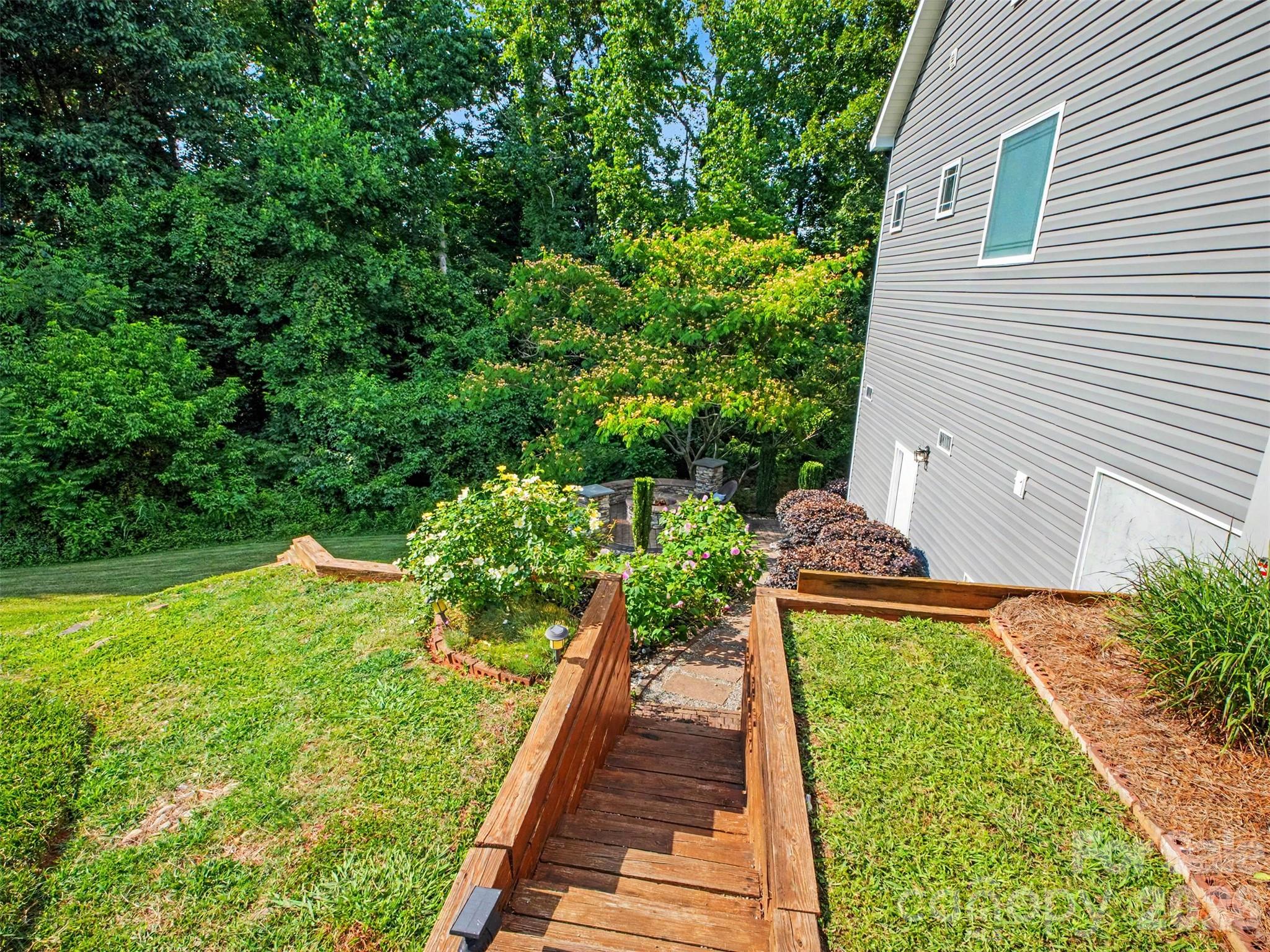 Door to very tall crawlspace area that has potential as basement - 155 Wood Acre Drive, Mooresville
