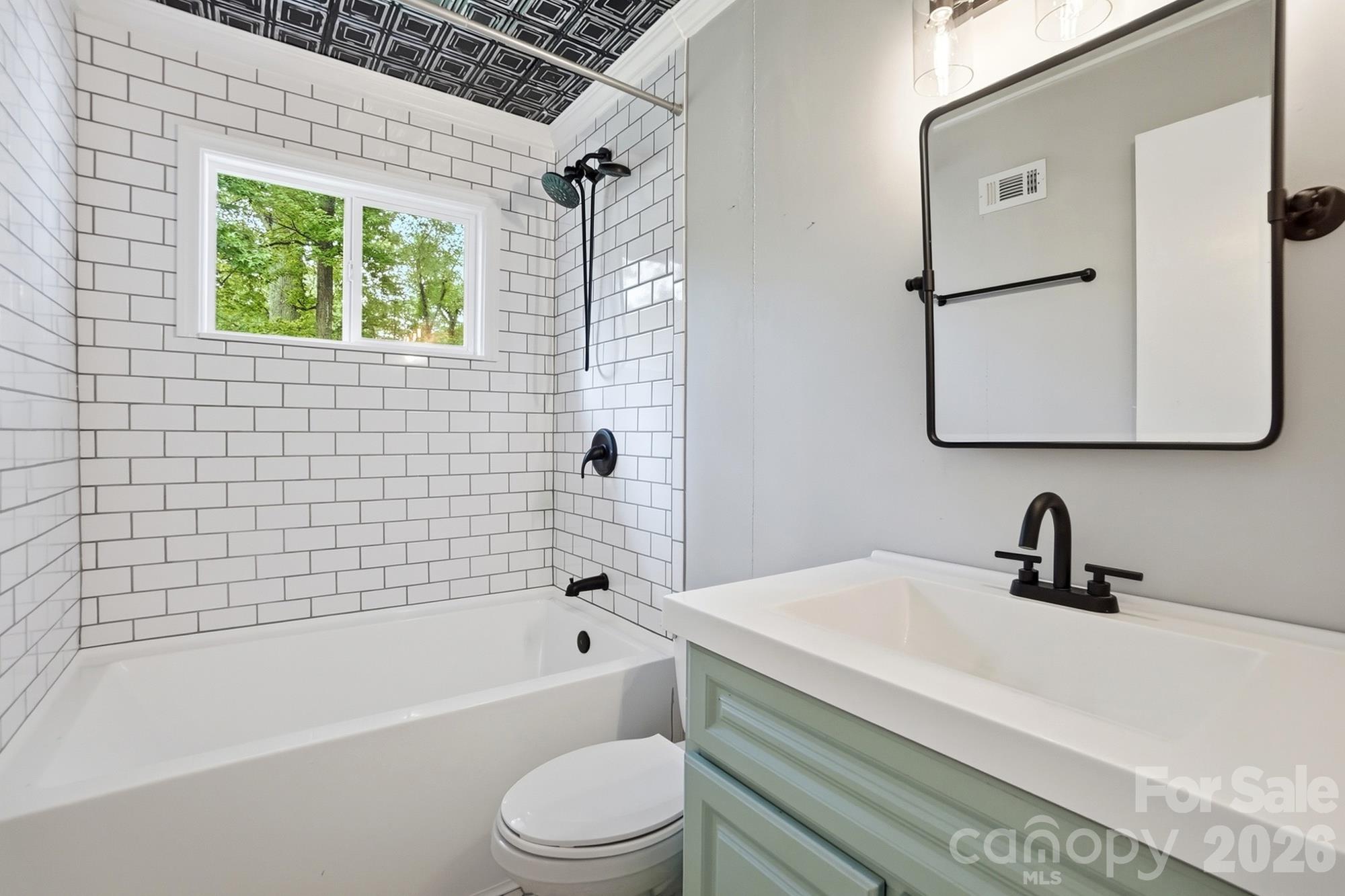 Full bathroom with hallway access - 6308 Covecreek Drive, Charlotte
