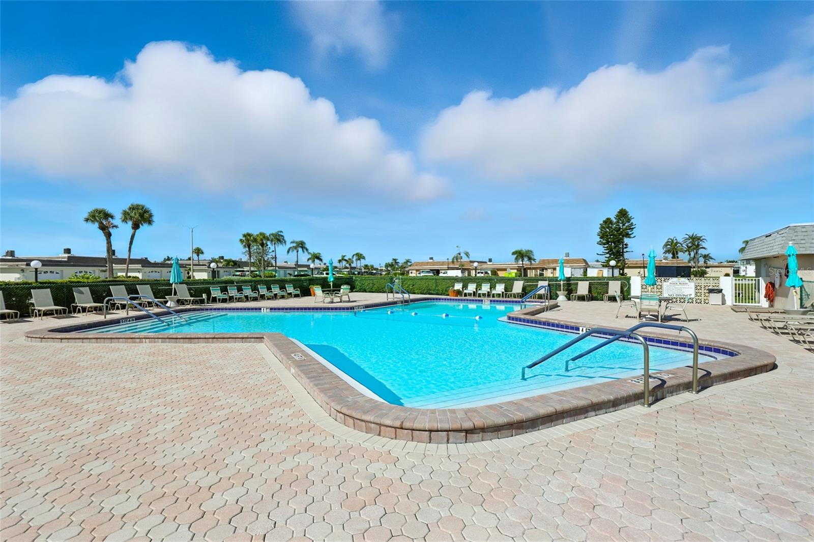 Community facilities include a heated swimming pool and sauna, tennis/pickleball courts, shuffleboard, bocci ball, 2 clubhouses, gym, library, card room, and active boating and social clubs. - 545 BOCA CIEGA POINT BLVD N, ST PETERSBURG