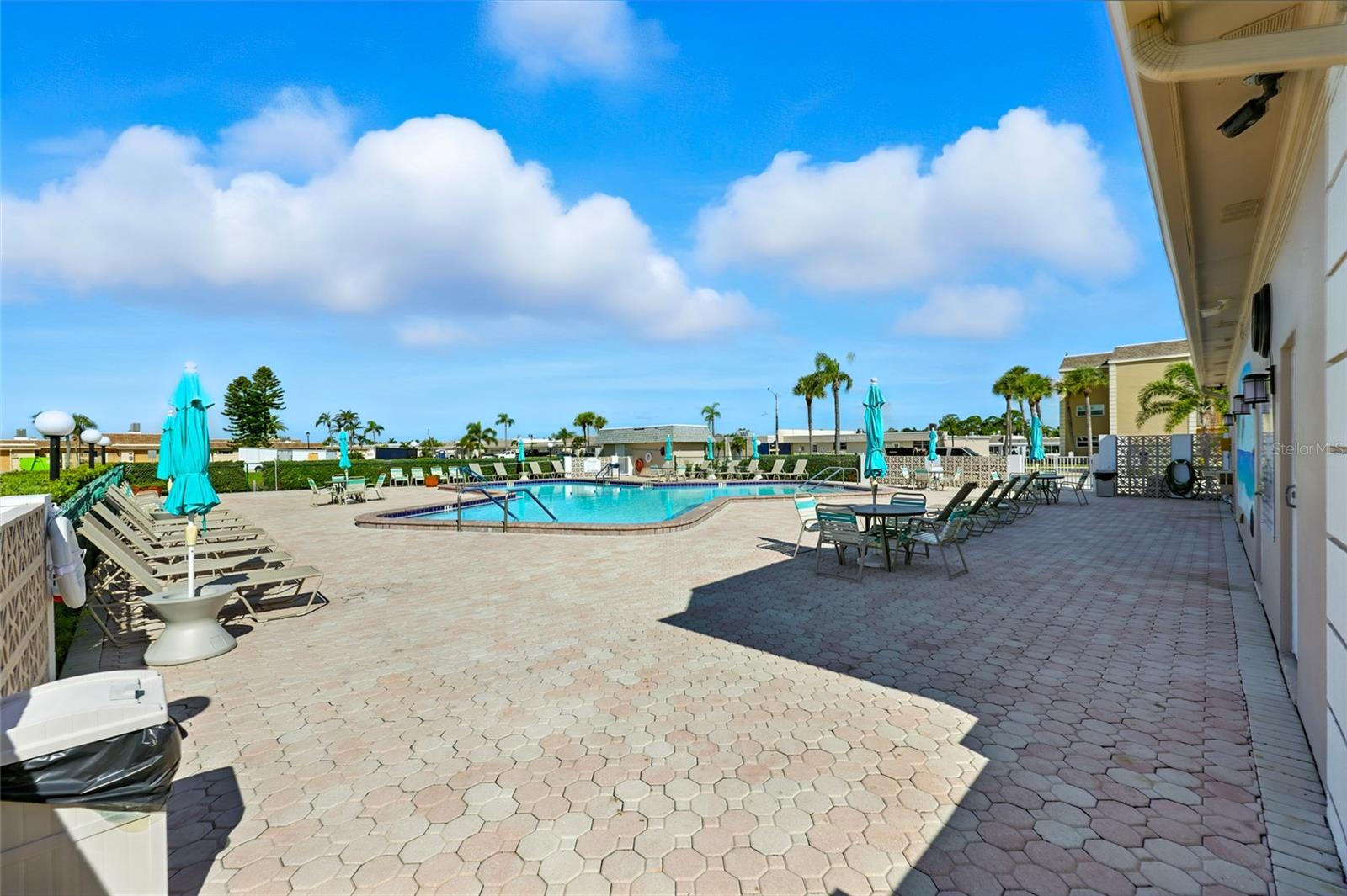 Community facilities include a heated swimming pool and sauna, tennis/pickleball courts, shuffleboard, bocci ball, 2 clubhouses, gym, library, card room, and active boating and social clubs. - 545 BOCA CIEGA POINT BLVD N, ST PETERSBURG