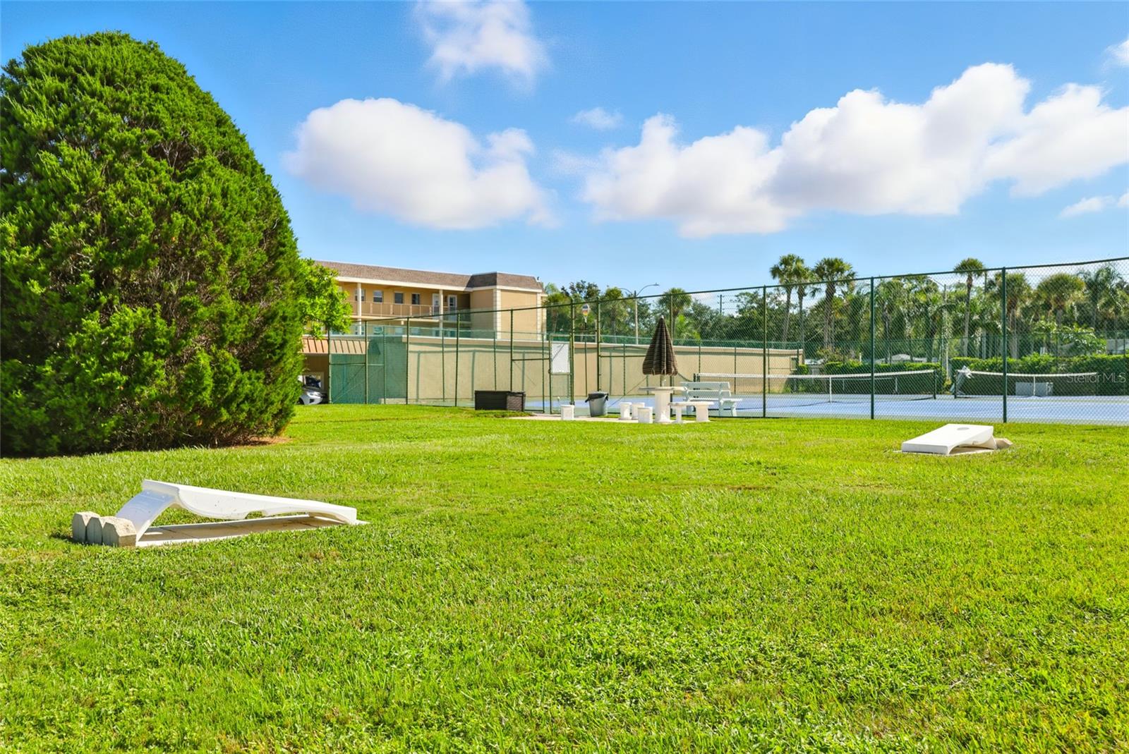 Community facilities include a heated swimming pool and sauna, tennis/pickleball courts, shuffleboard, bocci ball, 2 clubhouses, gym, library, card room, and active boating and social clubs. - 545 BOCA CIEGA POINT BLVD N, ST PETERSBURG