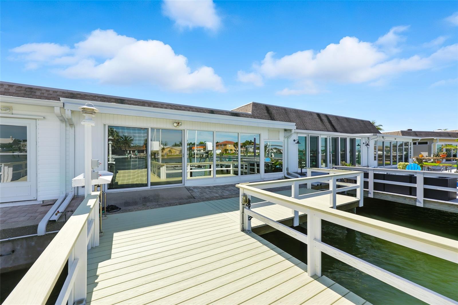 Bring your boat!  The private composite dock and boatslip is equipped with electric, water, and a fish cleaning station. - 545 BOCA CIEGA POINT BLVD N, ST PETERSBURG