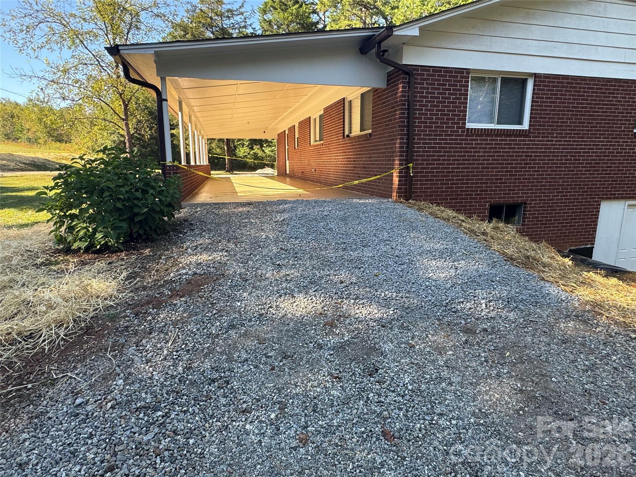 Carport Surface Recently Coated - 4370 Dynasty Lane, Hudson