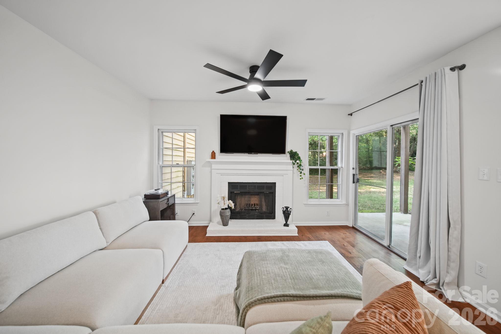Living Room featuring a Wood-burning Fireplace - 3302 Selwyn Farms Lane, Charlotte