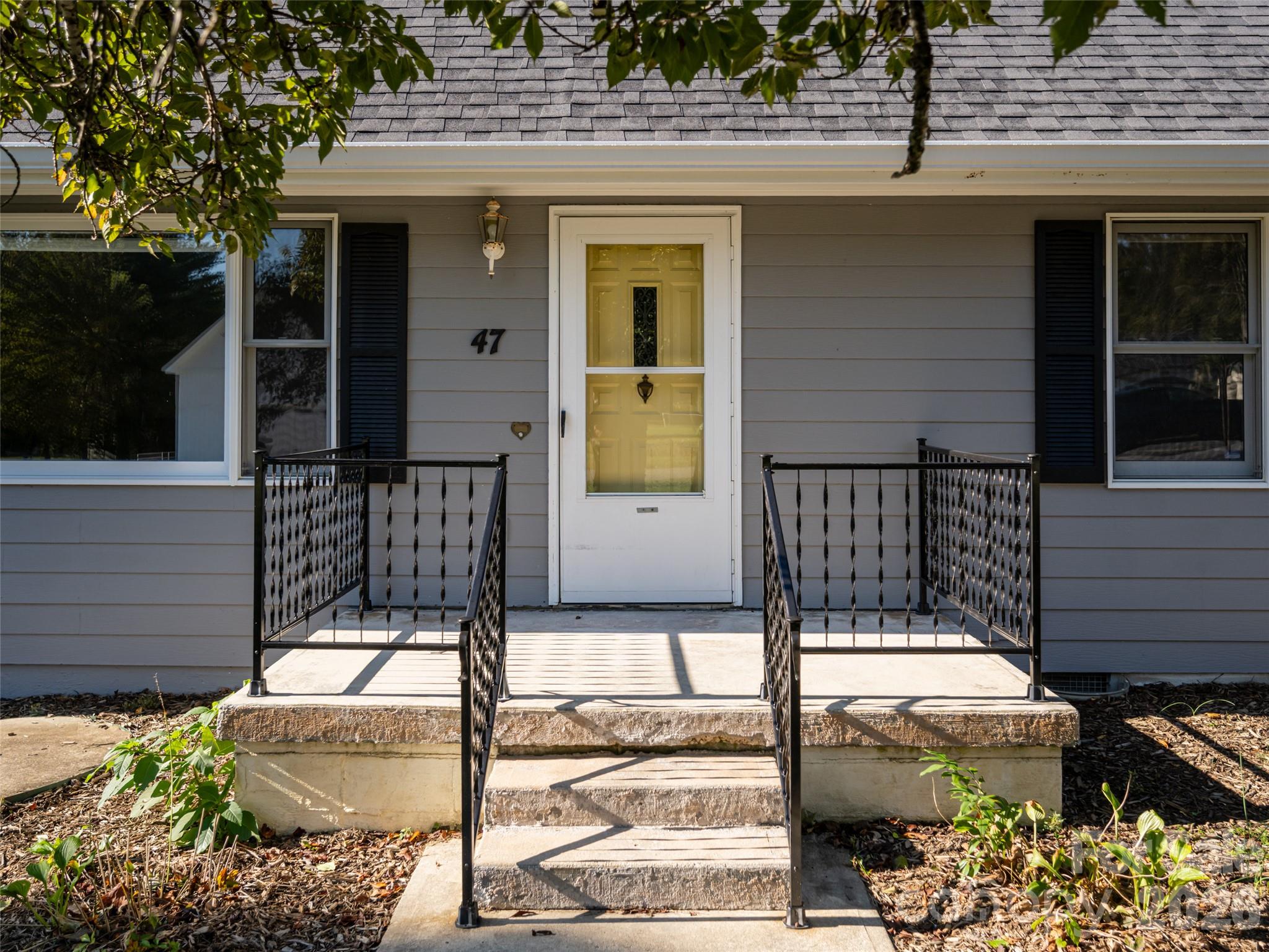 Welcoming front porch - 47 Cane Creek Circle, Fairview