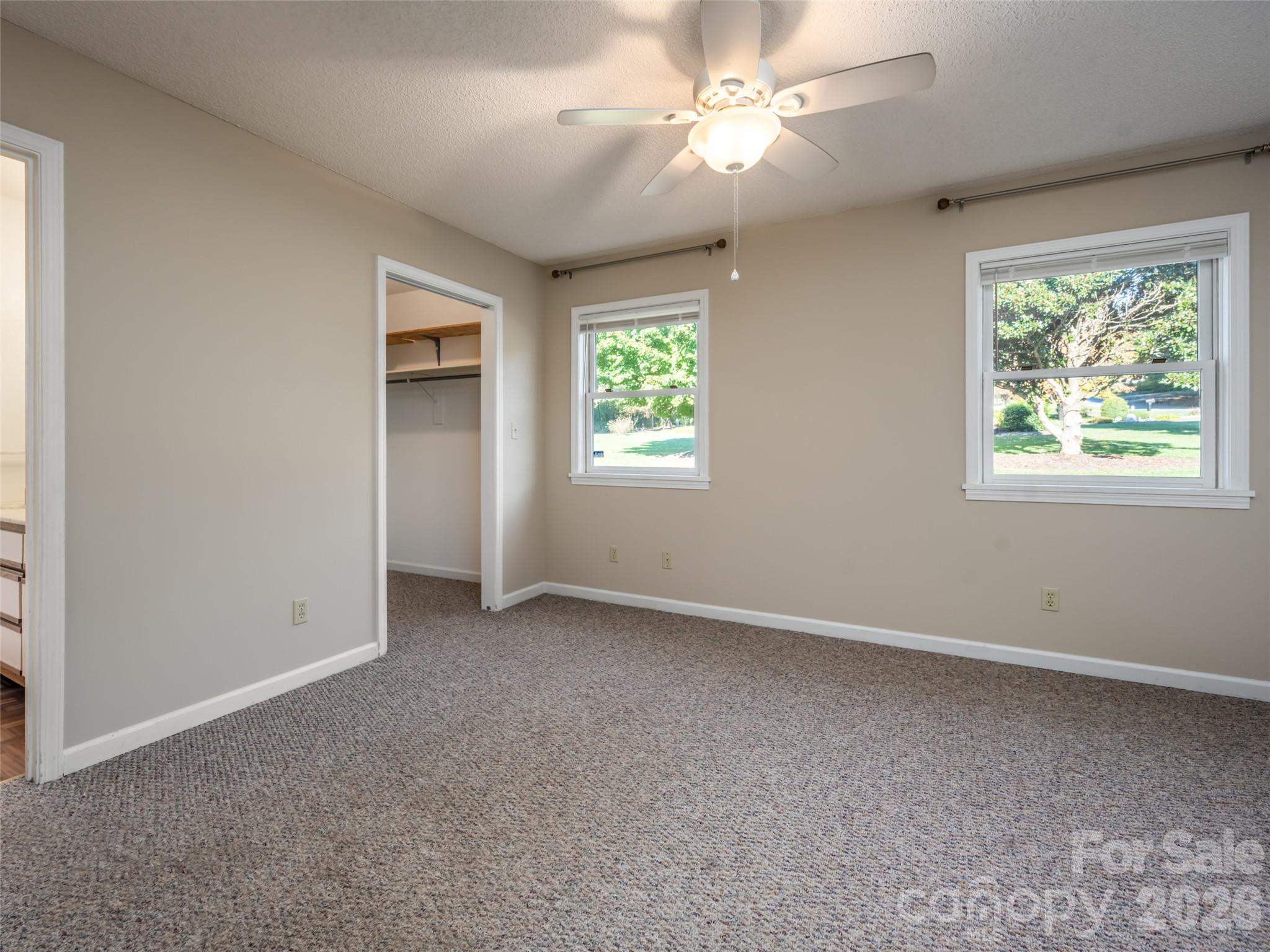 Primary bedroom on main level - 47 Cane Creek Circle, Fairview