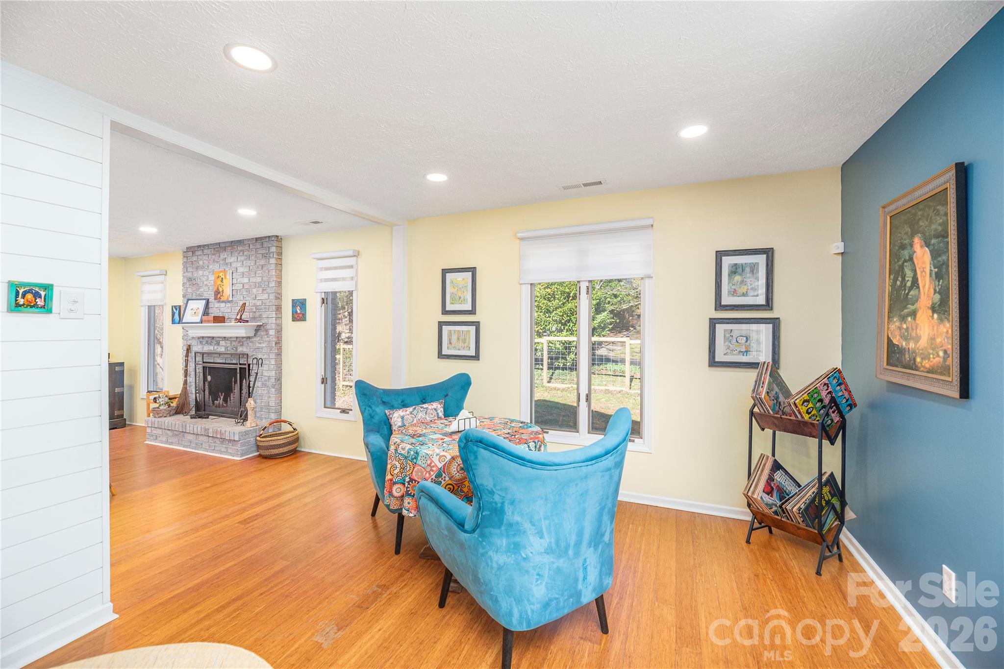 Living flows into dining/kitchen - 330 Woody Lane, Asheville