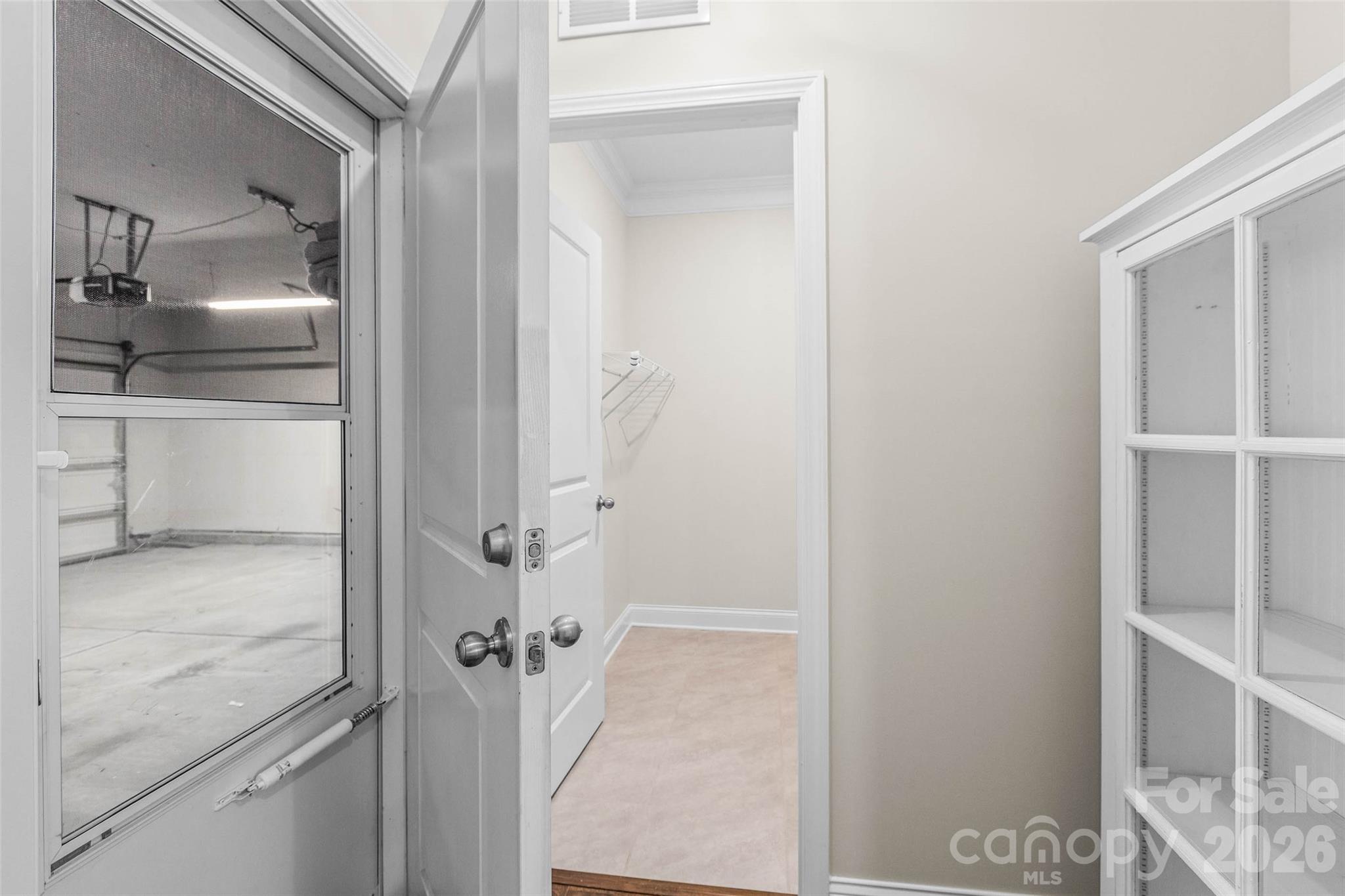 Storm door leading to garage - 4300 Legacy Drive, Denver
