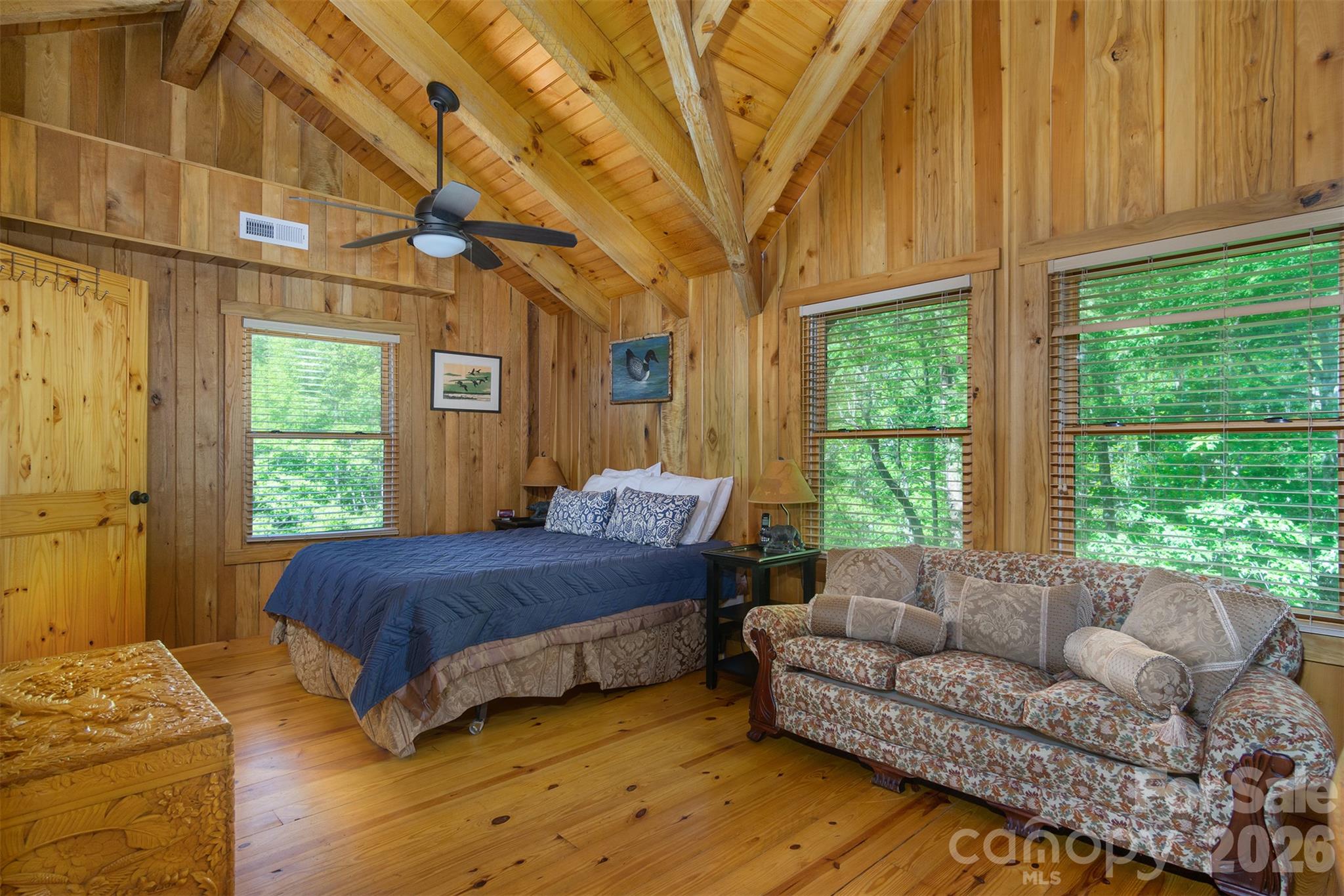 Master bedroom has high ceilings, storm windows, natural light and wood floors - 171 Camp Elliott Road, Black Mountain