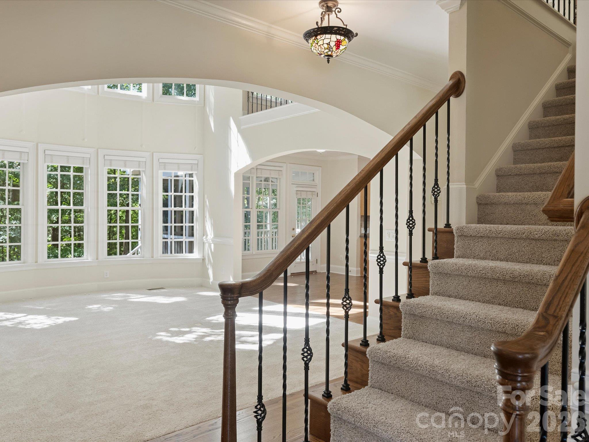 Incredible two-story great room with wall of windows - 7705 Stonehaven Drive, Waxhaw