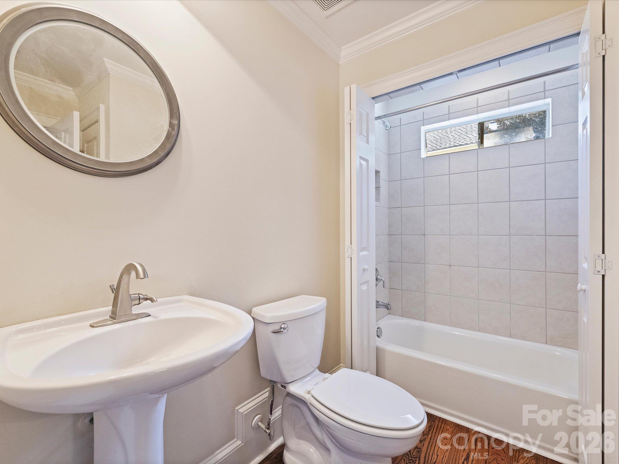 Powder room doubles as a full bath for guests - 7705 Stonehaven Drive, Waxhaw