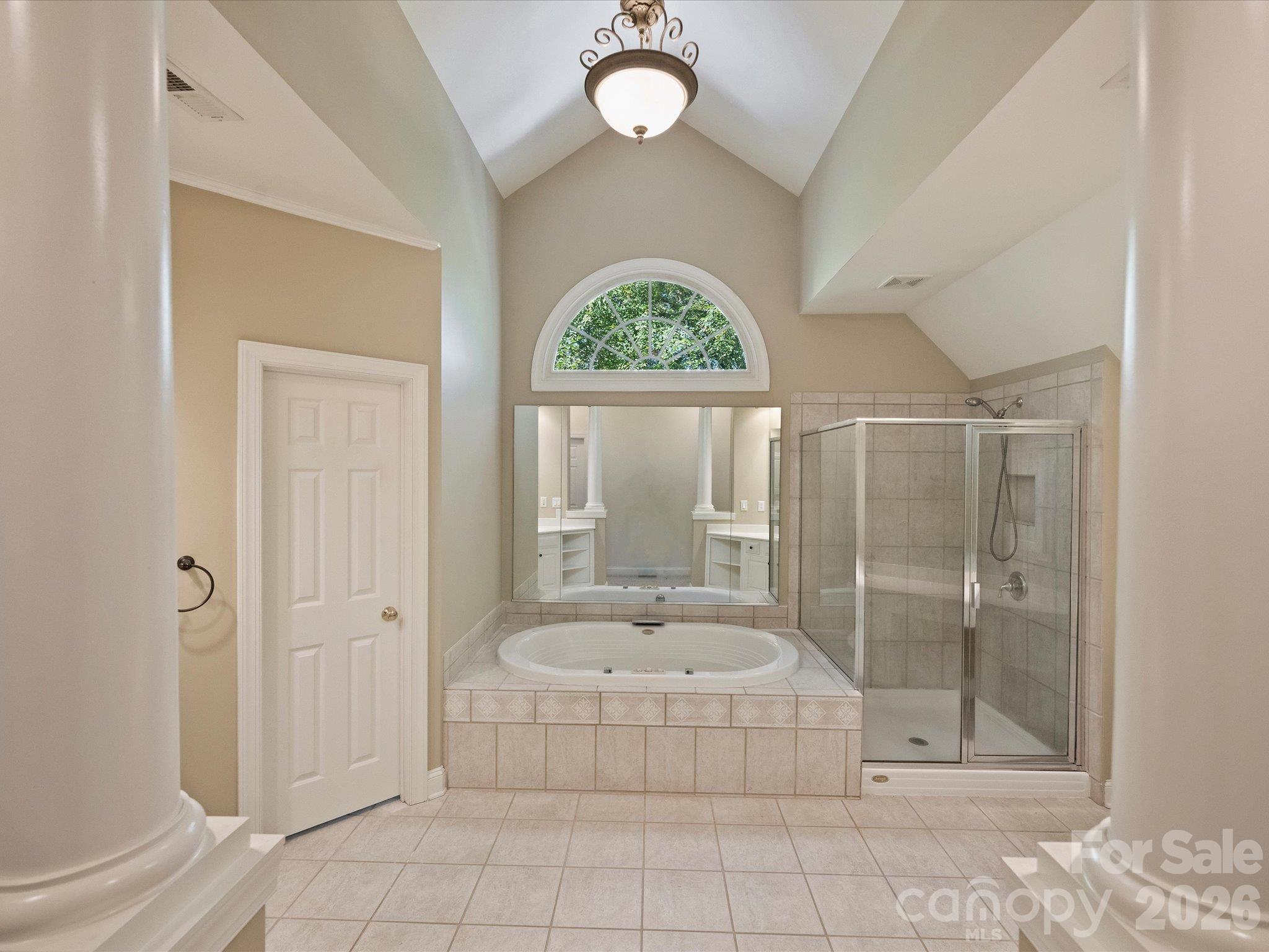 Large primary bath with soaking tub and separate shower - 7705 Stonehaven Drive, Waxhaw