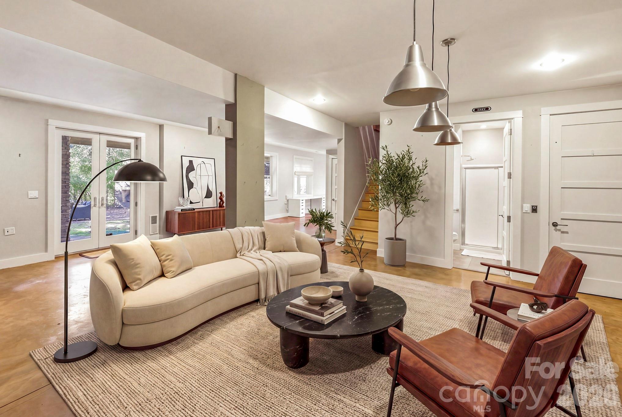 Basement den area, virtually staged - 167 Trails End, Lake Lure