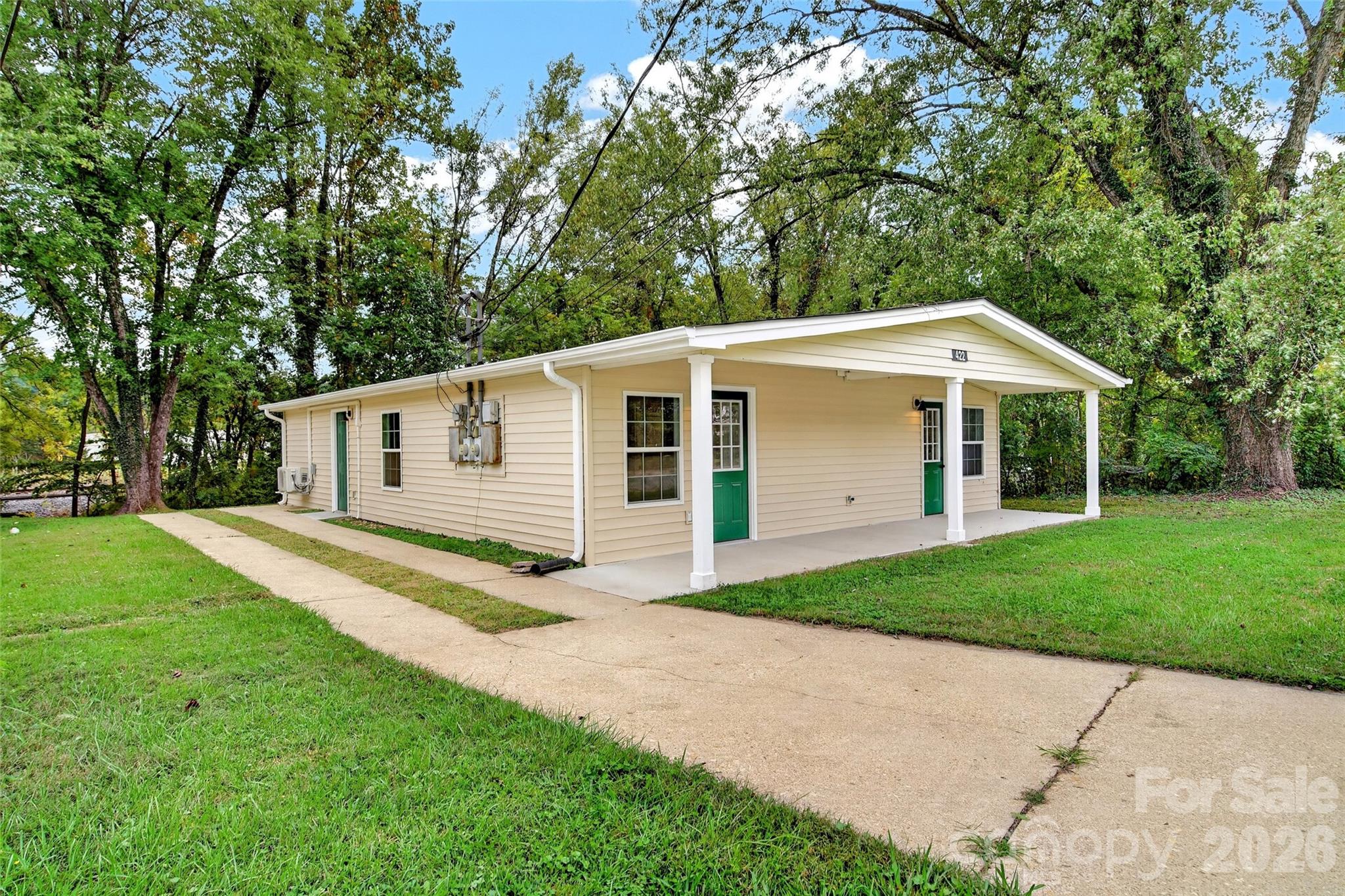 Side view of duplex. - 432 & 422 E Main Street, Old Fort